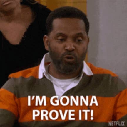 A man with a surprised expression wears a striped sweater. Text overlay reads, "I'm gonna prove it!"