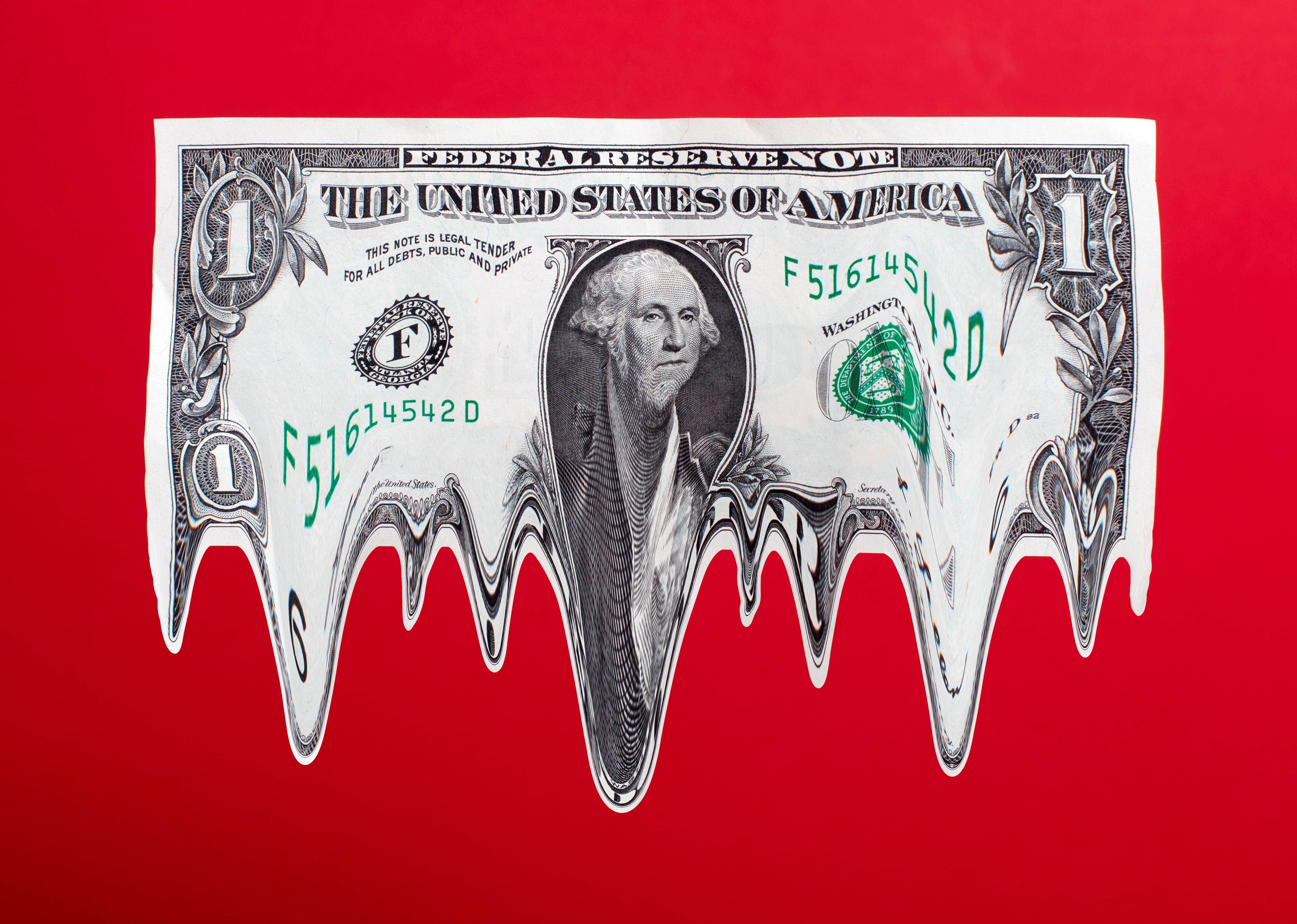U.S. dollar bill melting against a red background, symbolizing financial instability or currency devaluation