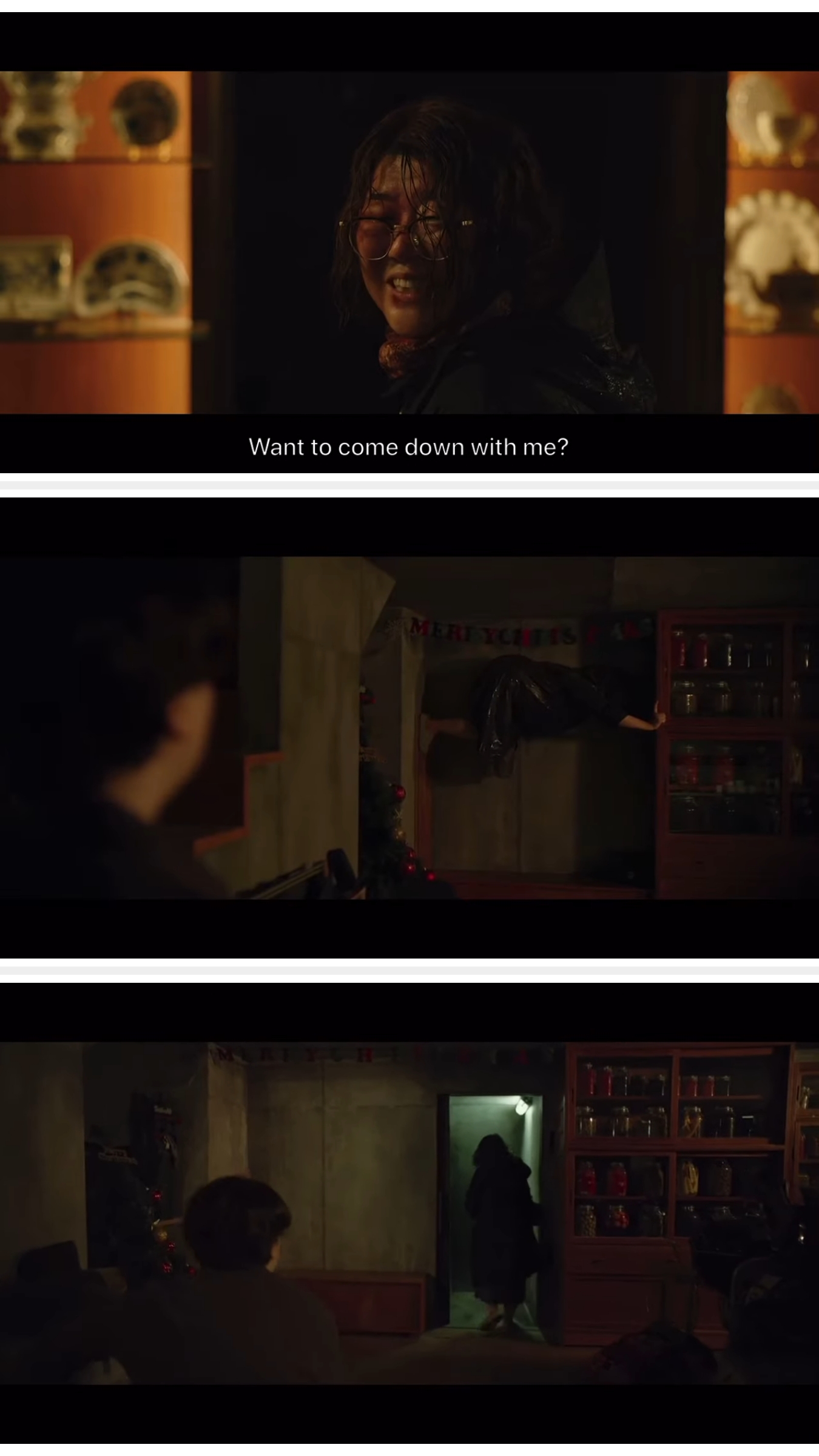 A person with an intense expression asks, "Want to come down with me?" before walking into a dimly lit room with Christmas decorations