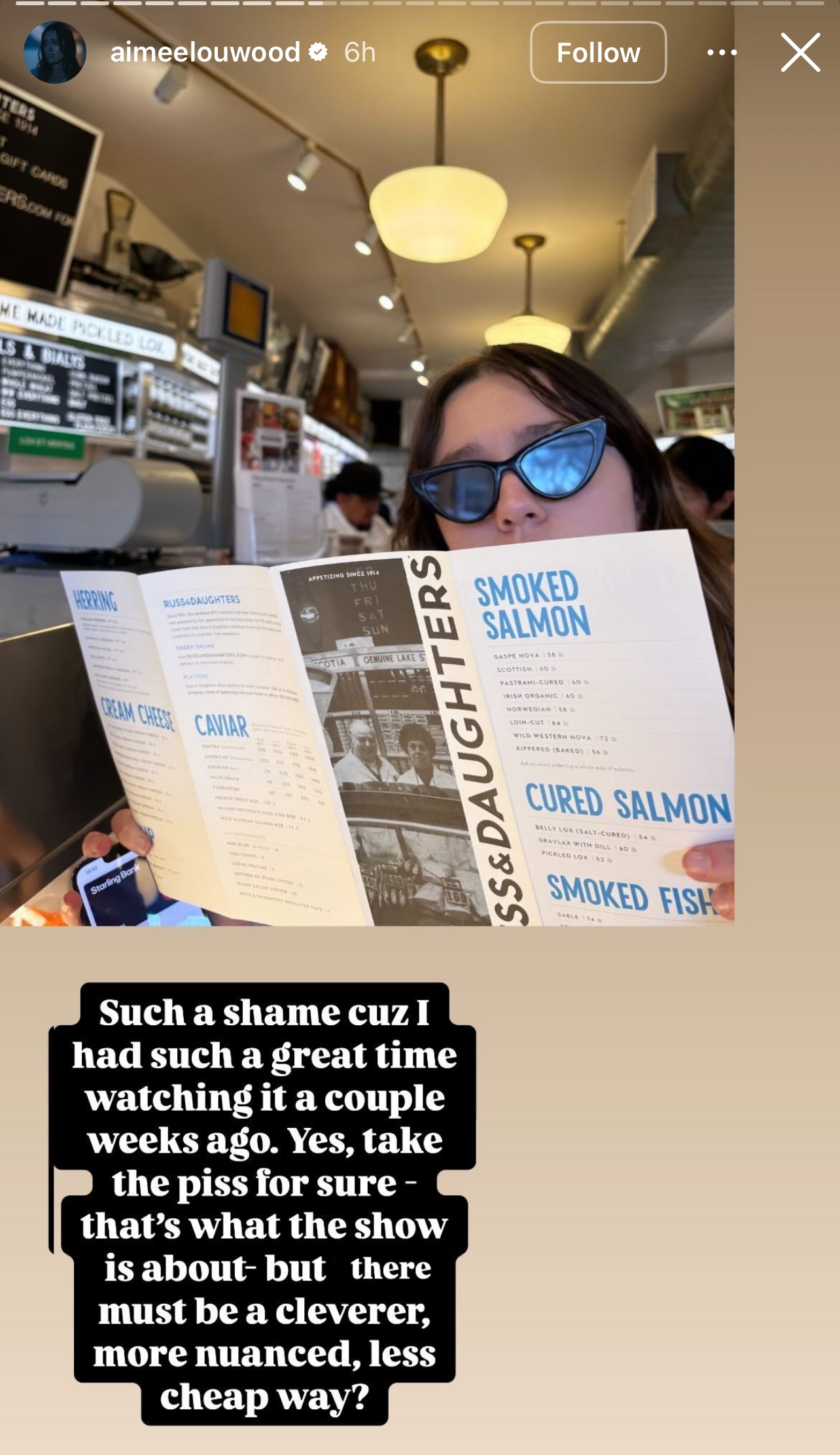 Person in a café reading a menu, wearing sunglasses. A text overlay discusses enjoying a show but suggests it should be more nuanced