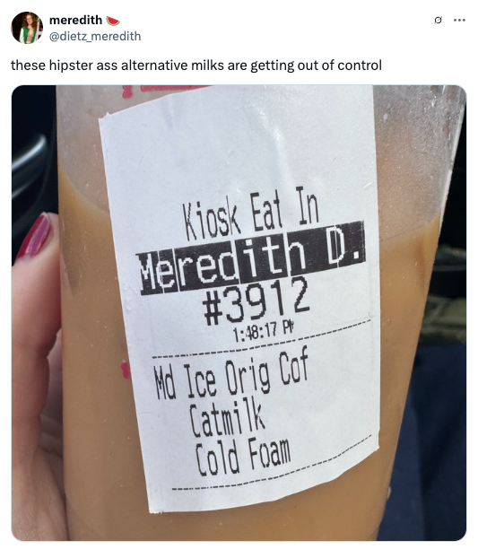 A coffee order receipt humorously labeled as "Catmilk" with a tweet above joking about alternative milks getting out of control