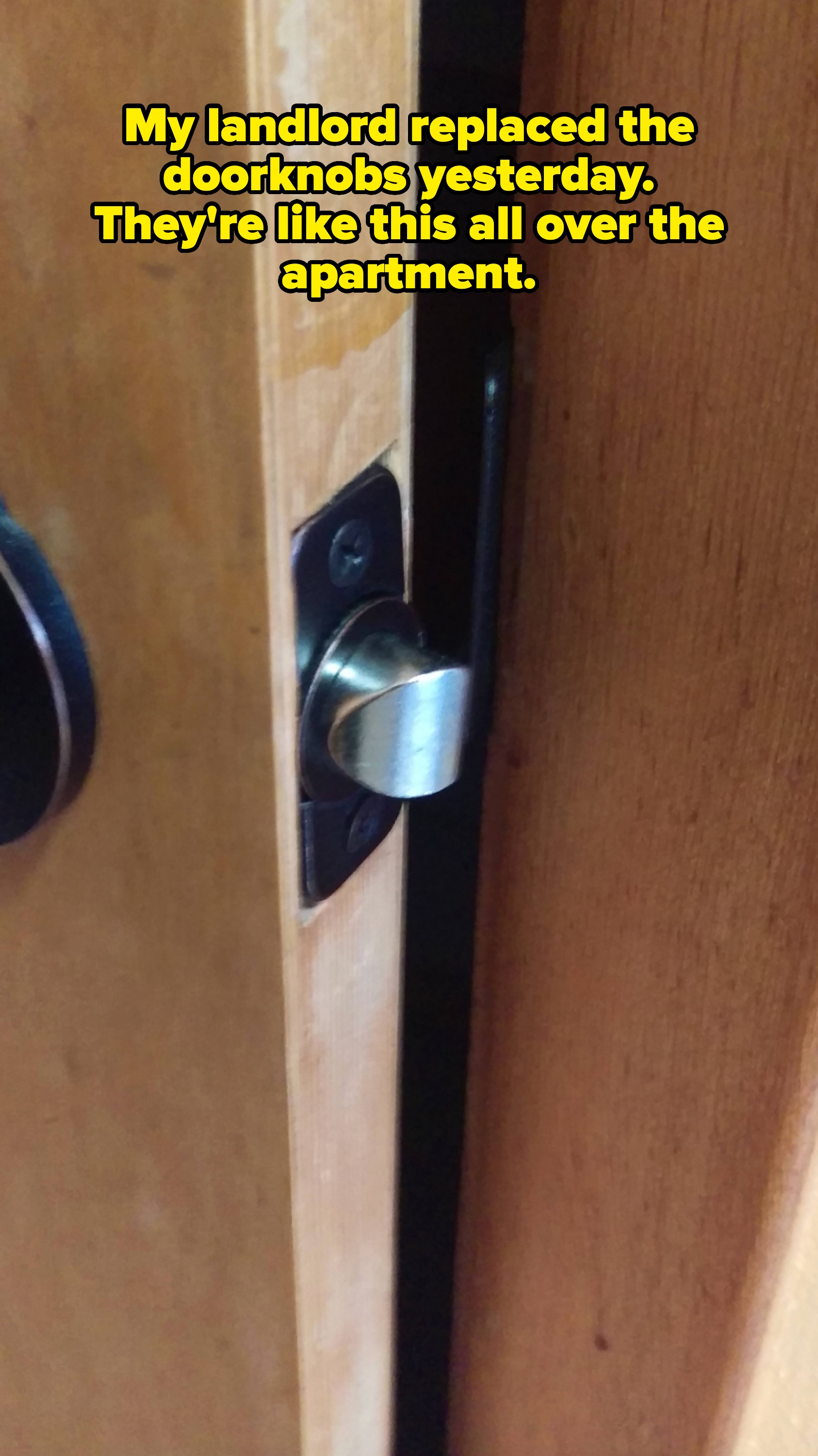 A door is open slightly, showing that the latch doesn't line up; caption reads "My landlord replaced the doorknobs yesterday. They're like this all over the apartment"