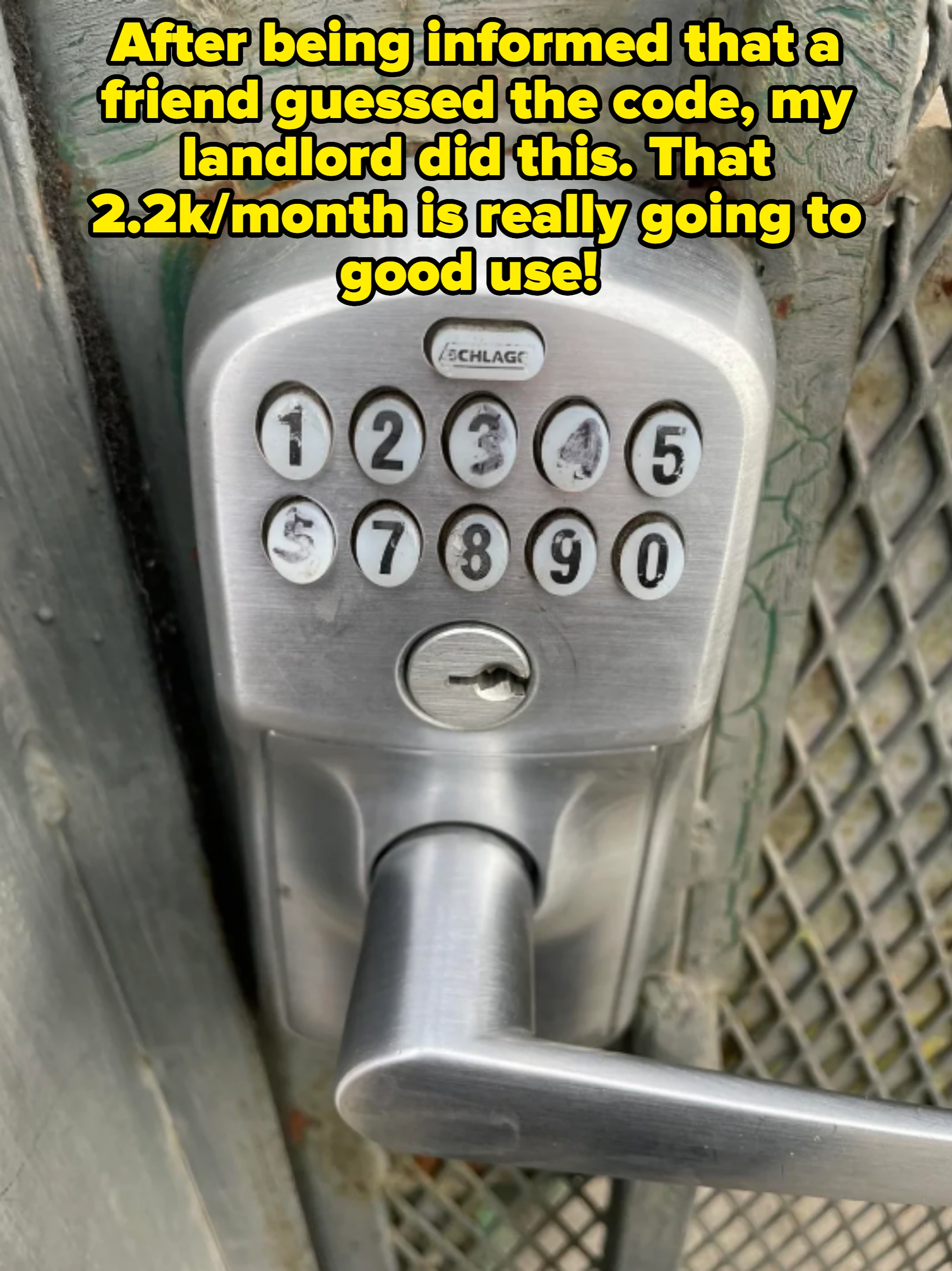 Keypad door lock with some numbers obviously worn away, revealing the numbers used in the password; the landlord has drawn over them to try to "fix" this, only making it more obvious