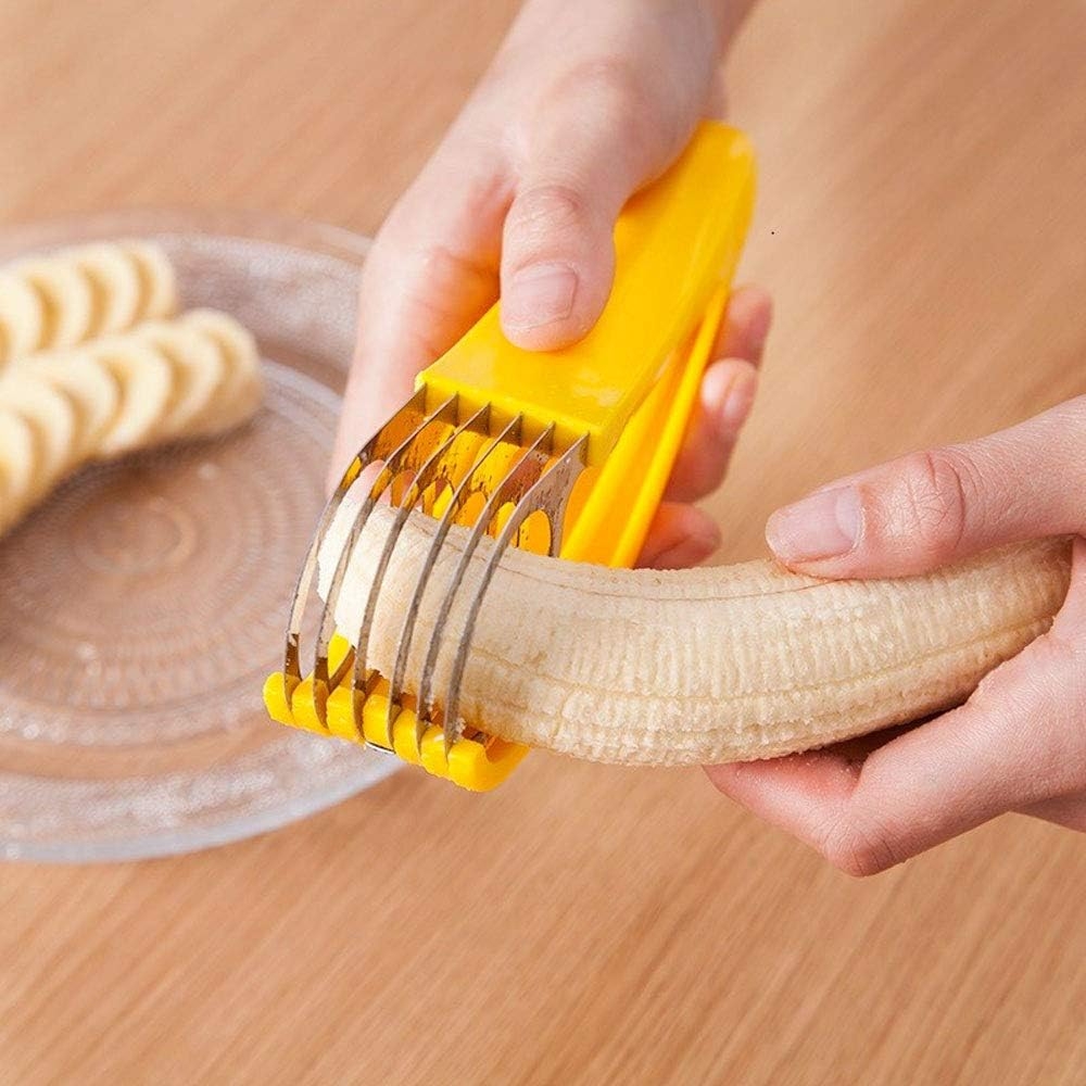 Person using a banana slicer to cut even slices onto a plate