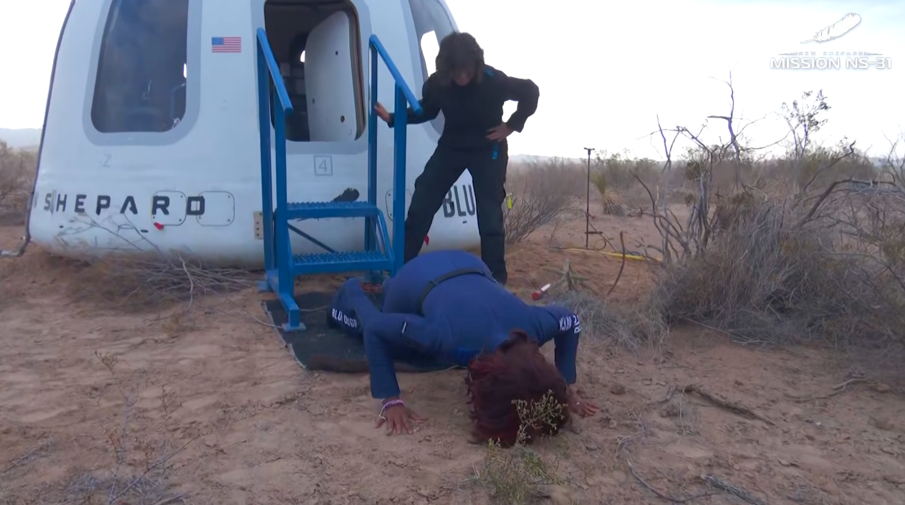 Gayle King kissing the ground after returning from space
