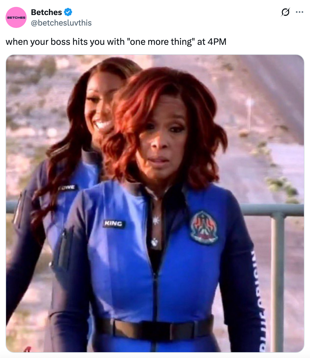 Two women look surprised, wearing blue racing suits. Text above says, "when your boss hits you with 'one more thing' at 4PM."