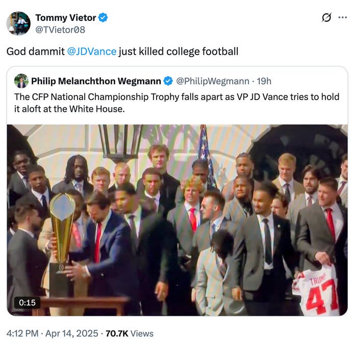 A group of people at a podium react as VP JD Vance accidentally drops the CFP National Championship Trophy at the White House event