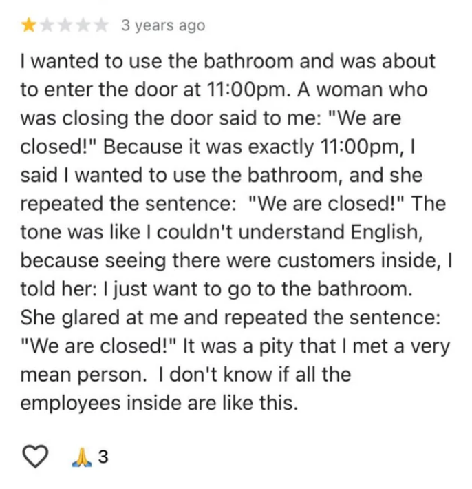 Review recounts an experience of being unable to use a restroom after closing time at 11:00 PM and encountering a rude employee