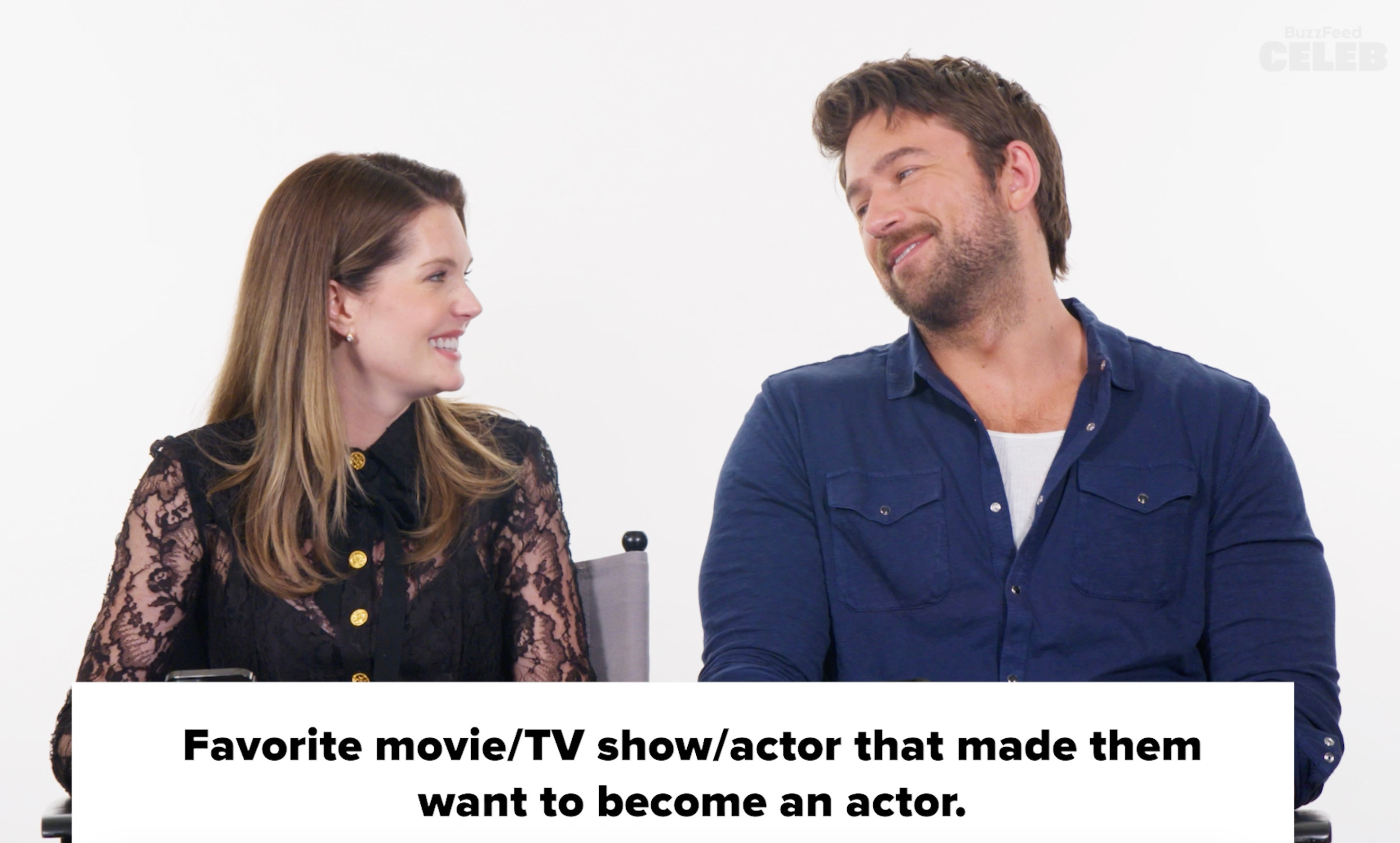 Meghann and Brandon smiling at each other in an interview setting. Text: "Favorite movie/TV show/actor that made them want to become an actor."
