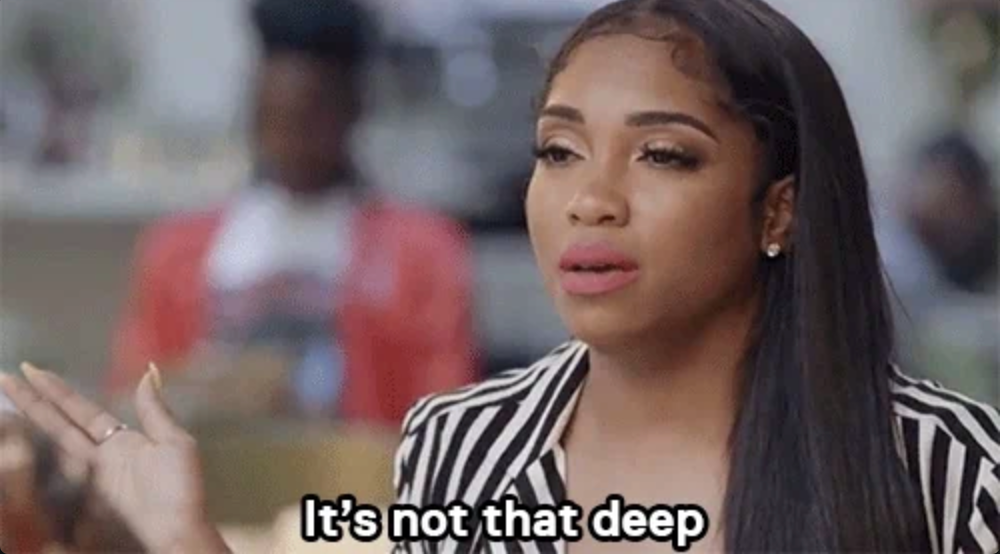 Person gesturing dismissively with hand raised, saying "It's not that deep."