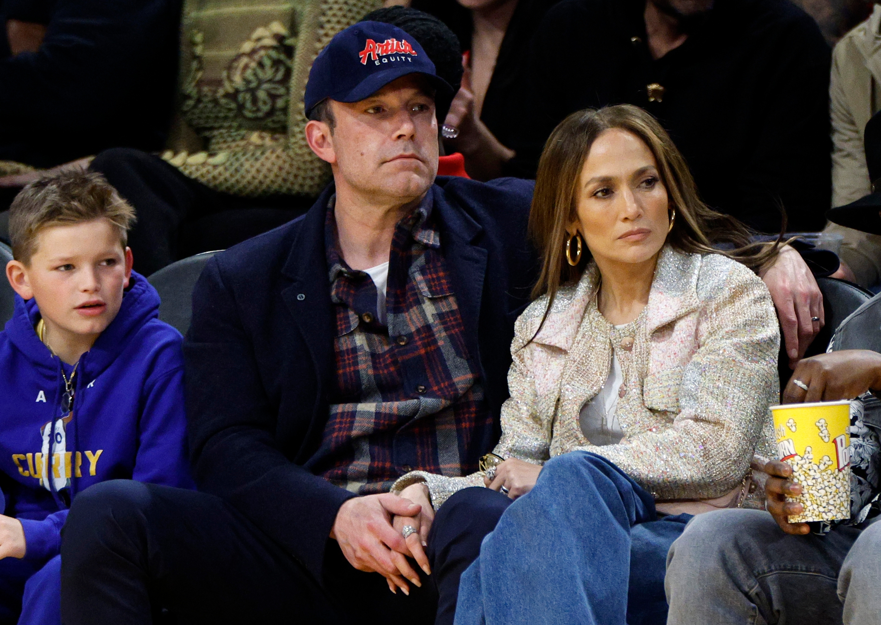 Jennifer Lopez, Ben Affleck and Samuel Affleck at a basketball game