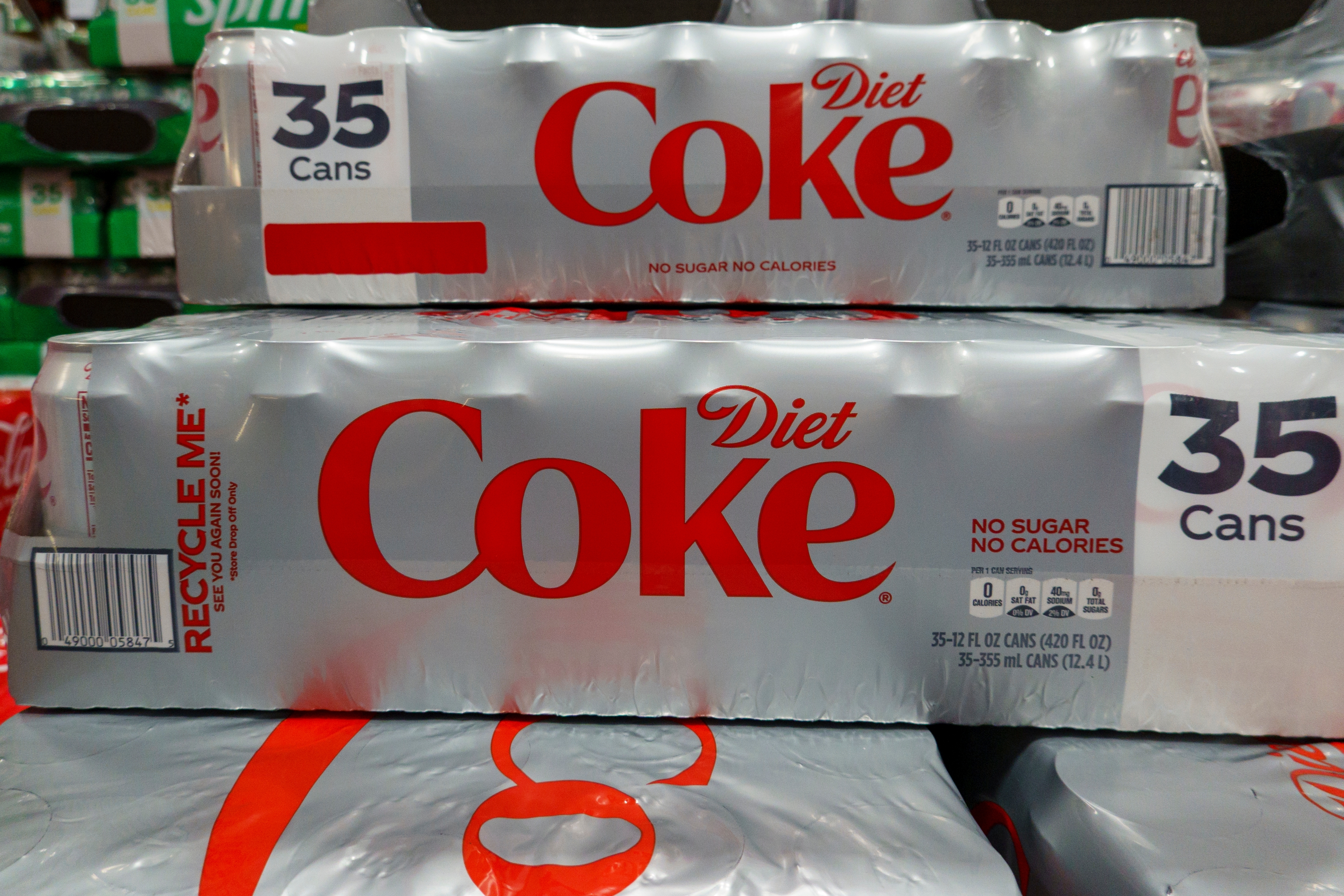 Two packs of 35 Diet Coke cans are stacked in a store display