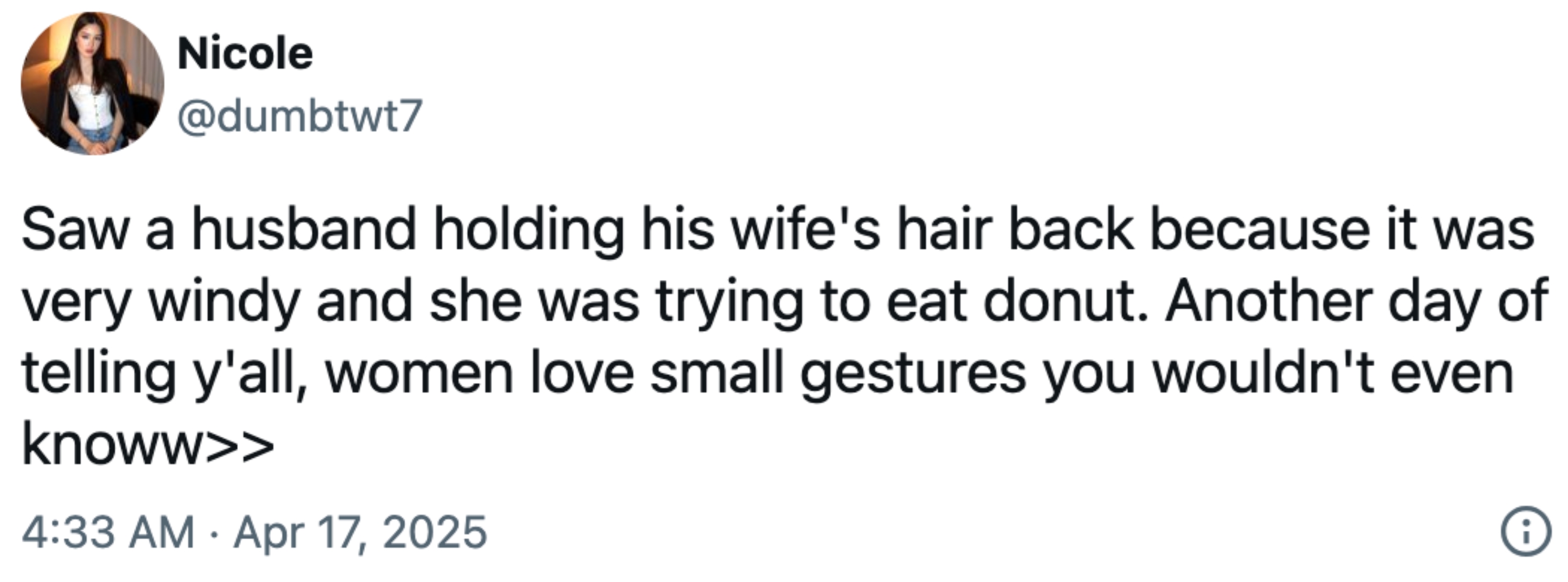 Tweet about a husband holding his wife's hair while she eats a donut on a windy day, highlighting appreciation for small gestures