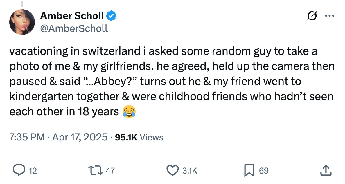 vacationing in switzerland I asked a guy to take a photo of me and my girlfriends. turns out he and my friend went to kindergarten together and were childhood friends who hadn't seen each other in 18 years