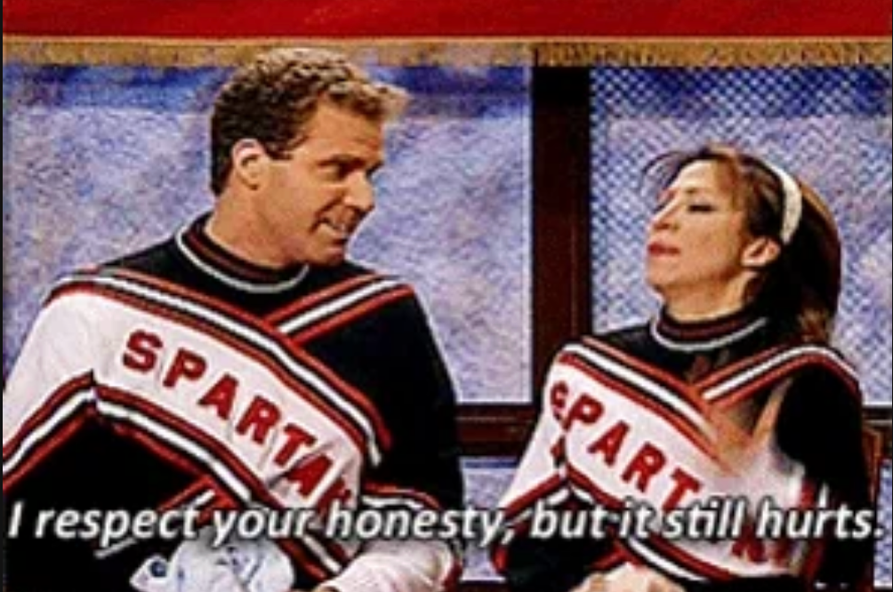 Will Ferrell and Cheri Oteri in Spartan cheerleader outfits in an SNL sketch. Oteri says, "I respect your honesty, but it still hurts"
