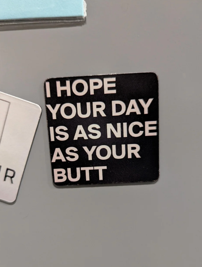 Sticker with bold text: "I HOPE YOUR DAY IS AS NICE AS YOUR BUTT."