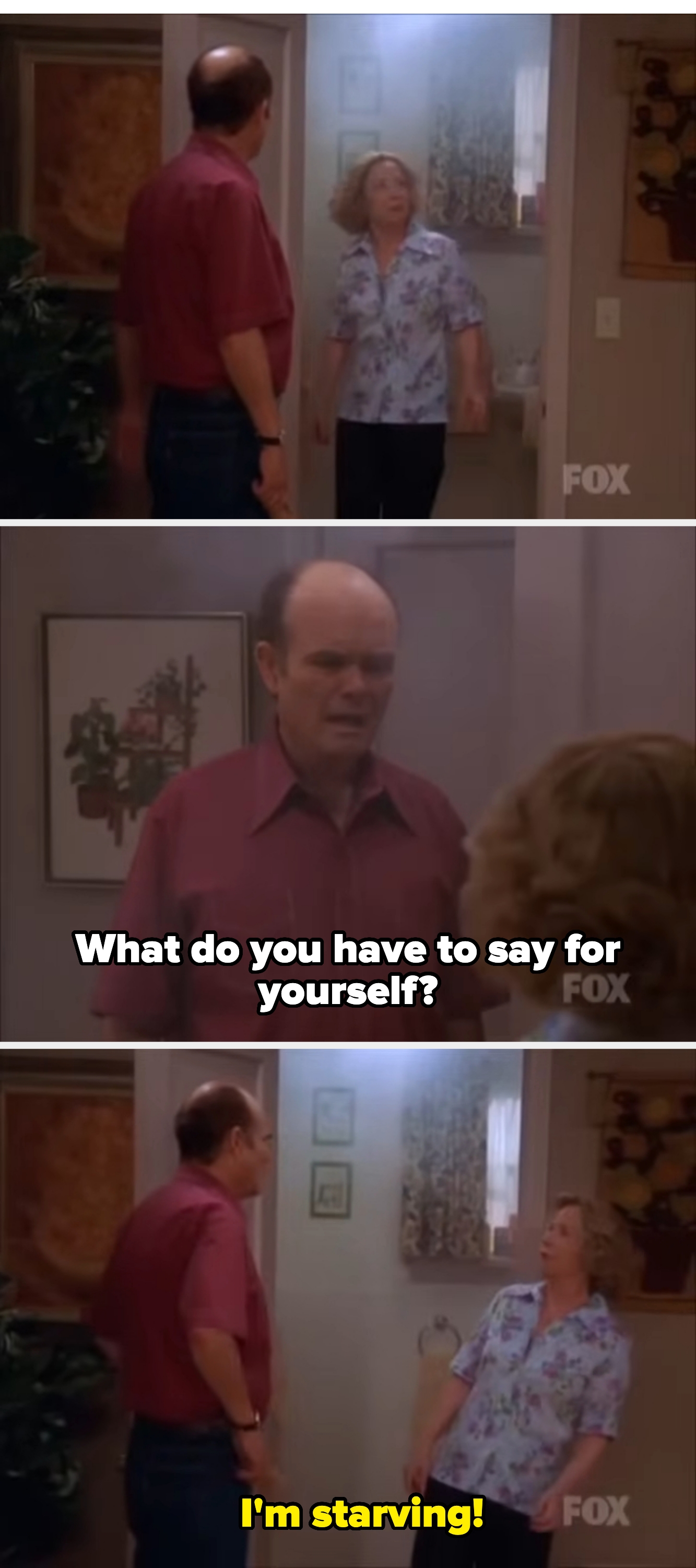 Two people stand in a doorway. One appears surprised, possibly reacting to something inside the room they are looking into