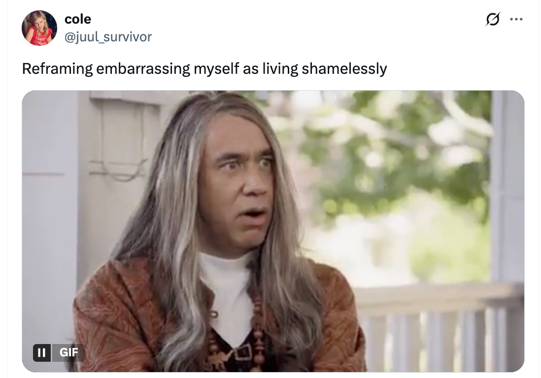 Person with long hair looking surprised, wearing a patterned jacket and white shirt. Caption reads: &quot;Reframing embarrassing myself as living shamelessly.&quot;