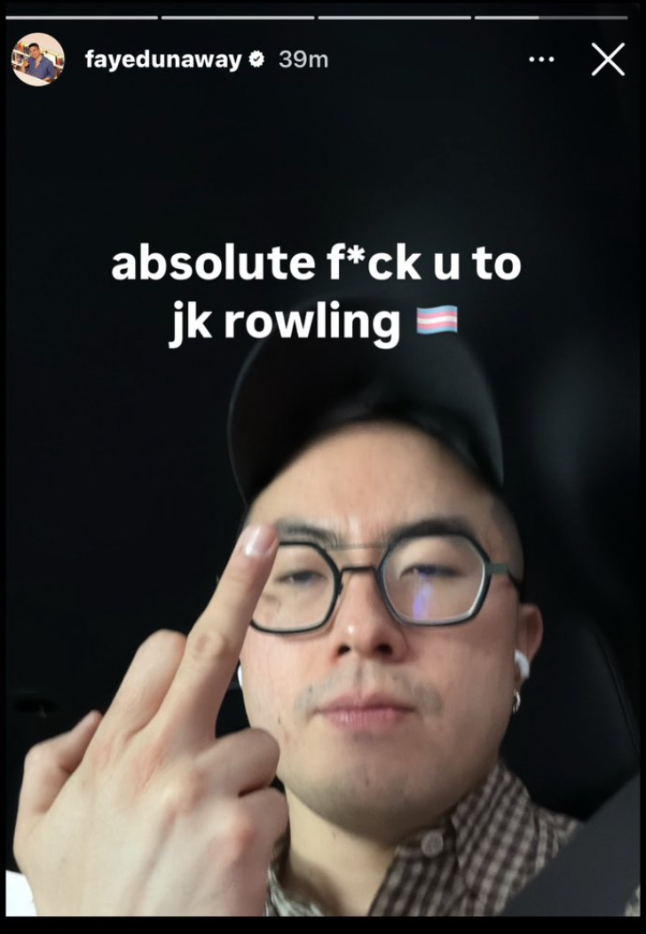 Person wearing glasses and cap shows middle finger. Text reads: "absolute f*ck u to jk rowling" with a transgender flag emoji