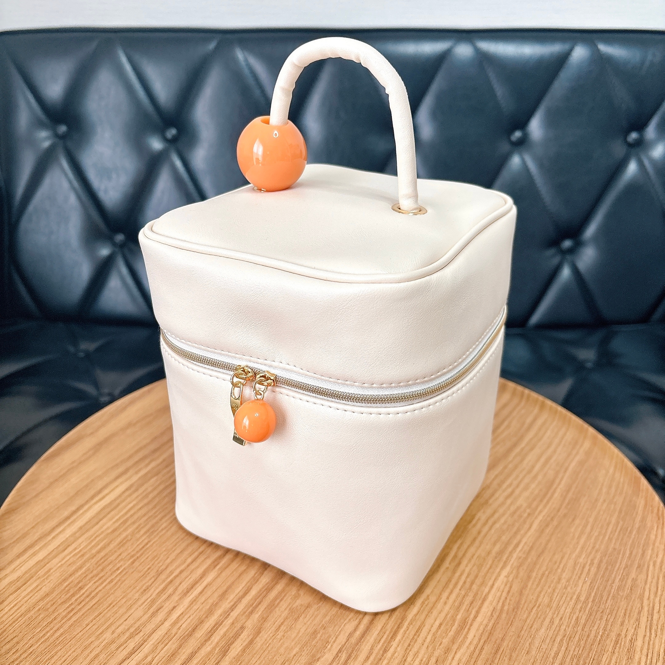 Francfranc(フランフラン)の「ウェーブシェイプ バニティポーチ S アイボリー」