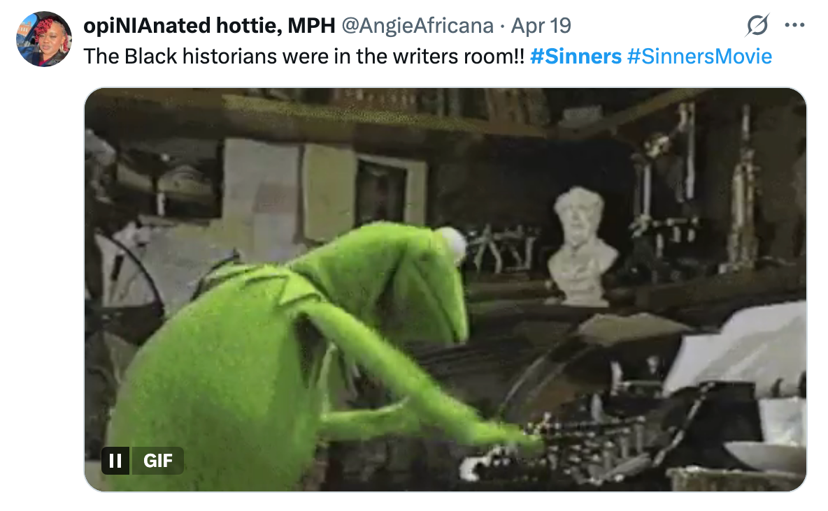 Kermit the Frog energetically types on a typewriter in a cluttered office