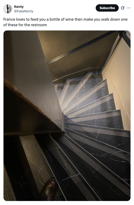 Steep, narrow staircase seen from above, caption jokes about navigating it after drinking wine in France