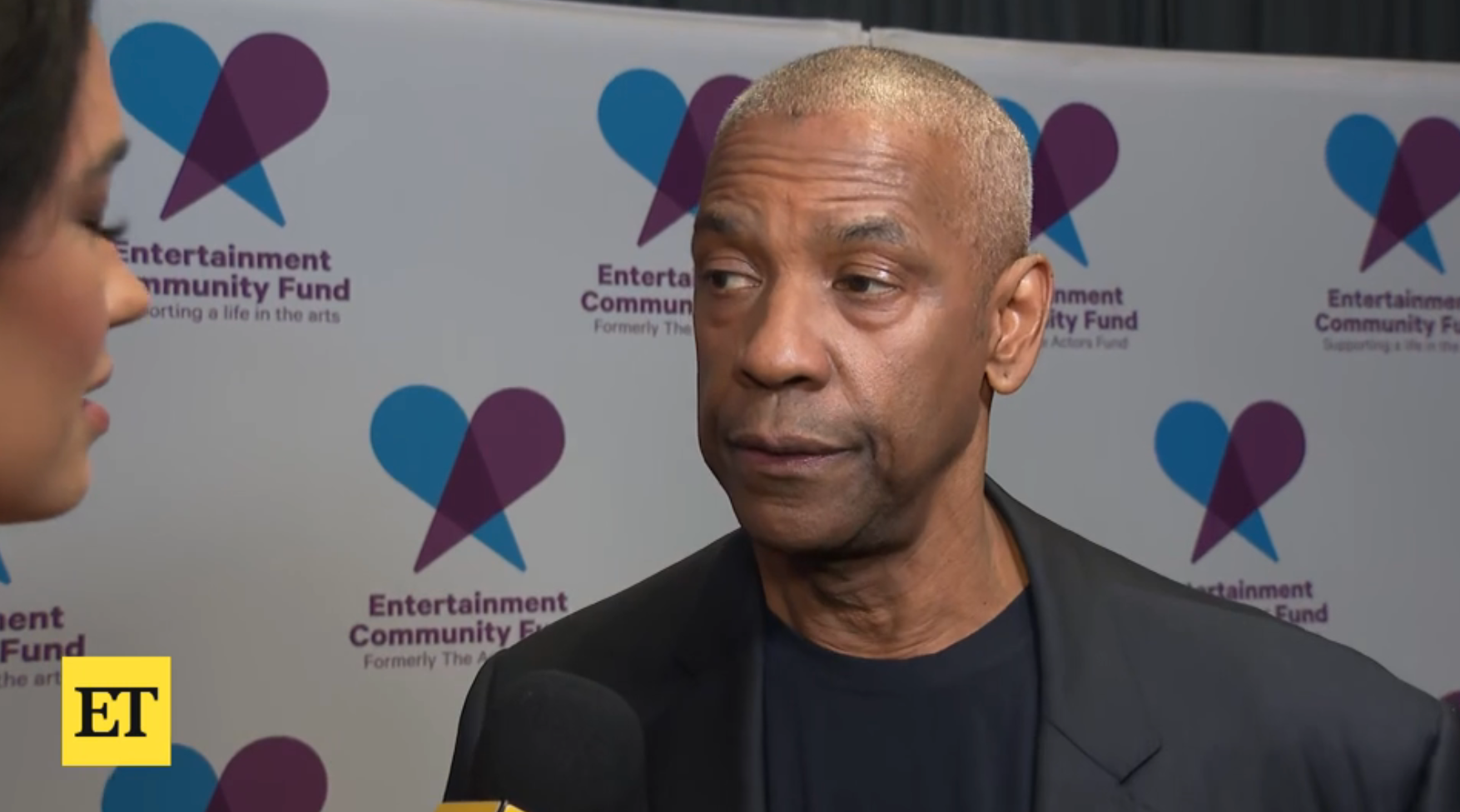 Denzel Washington during a red carpet interview with ET