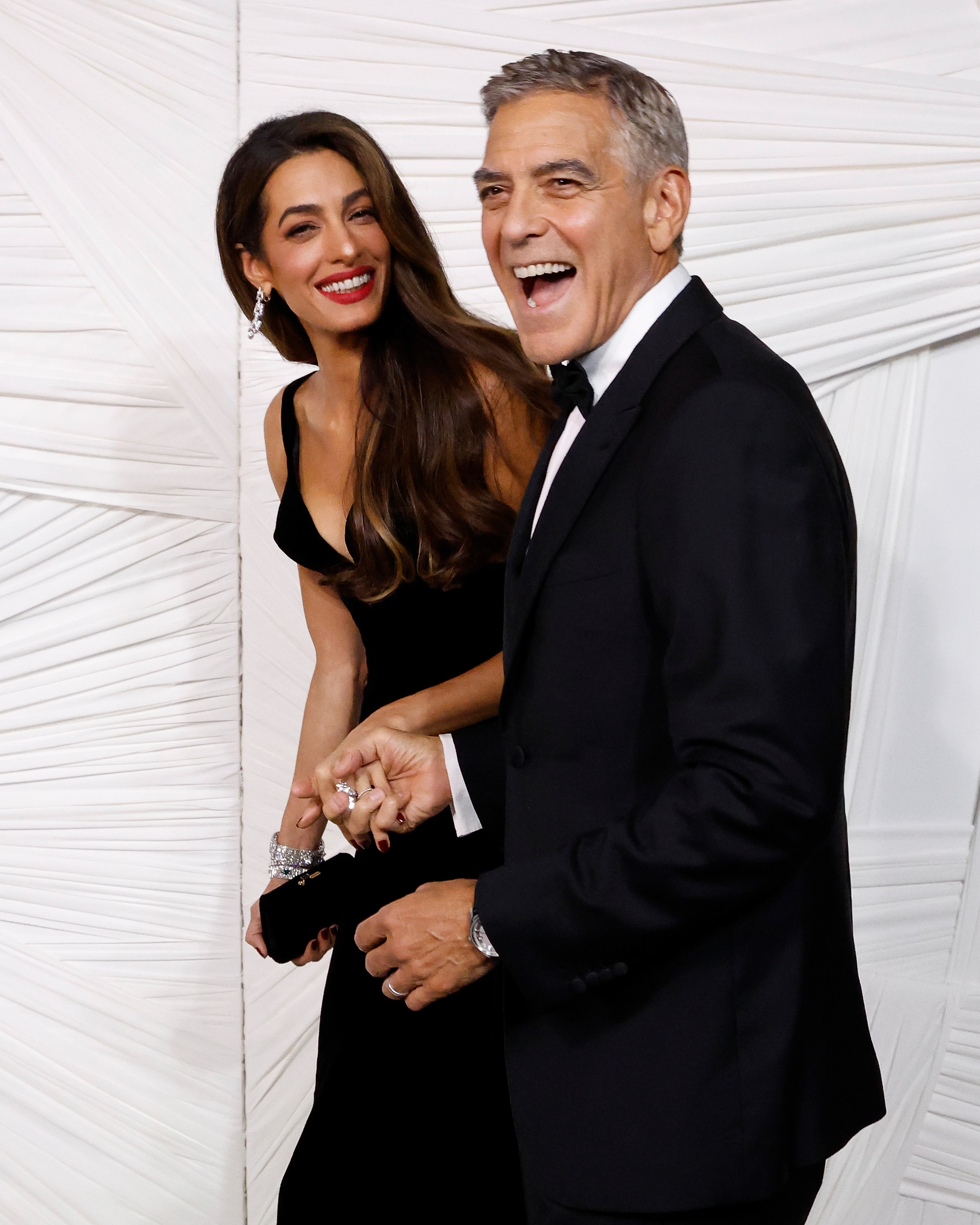 George Clooney and Amal Clooney at a formal event