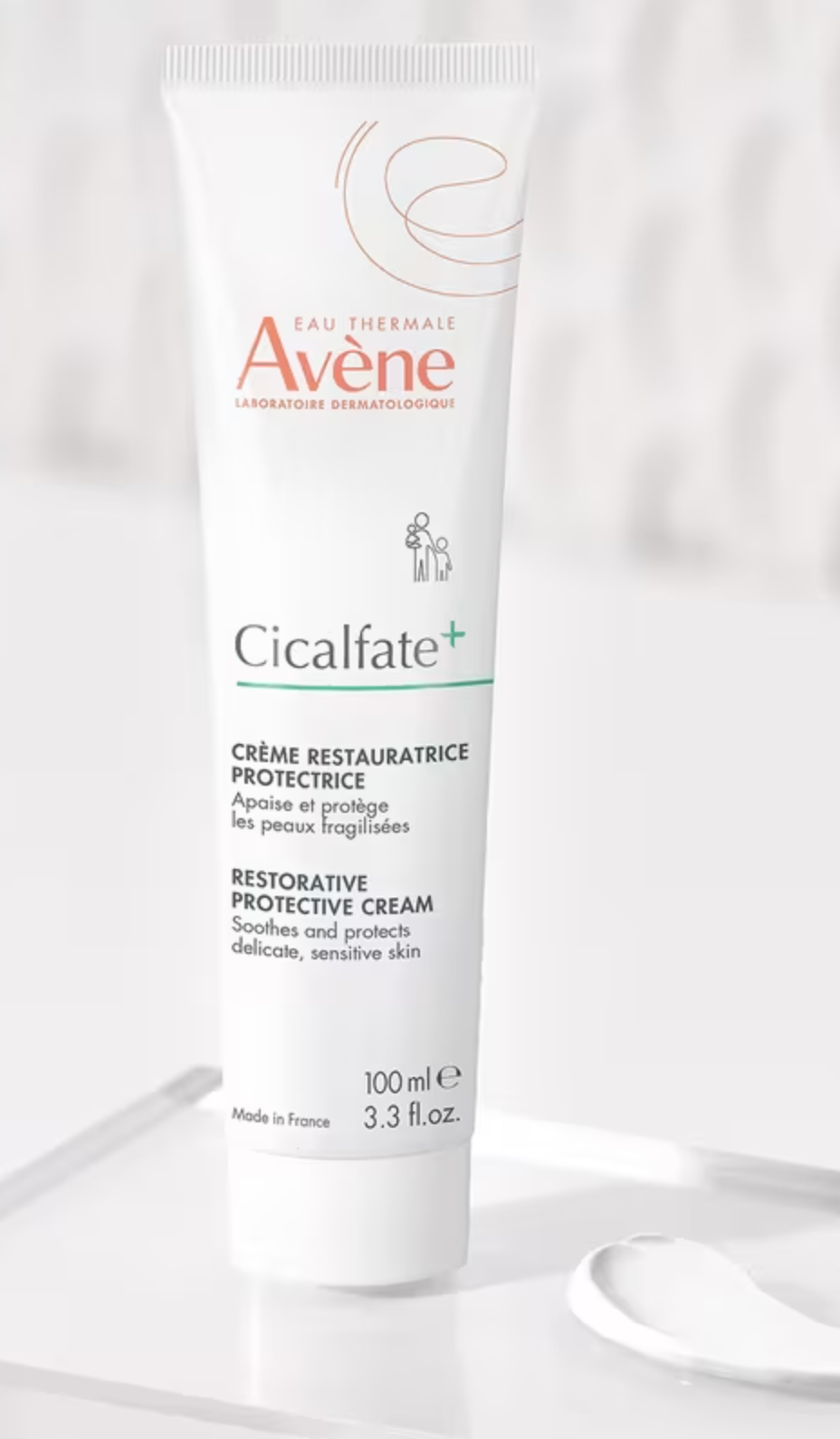 Tube of Avène Cicalfate+ Restorative Protective Cream connected  a surface. Descriptions successful  some  English and French item   its soothing properties