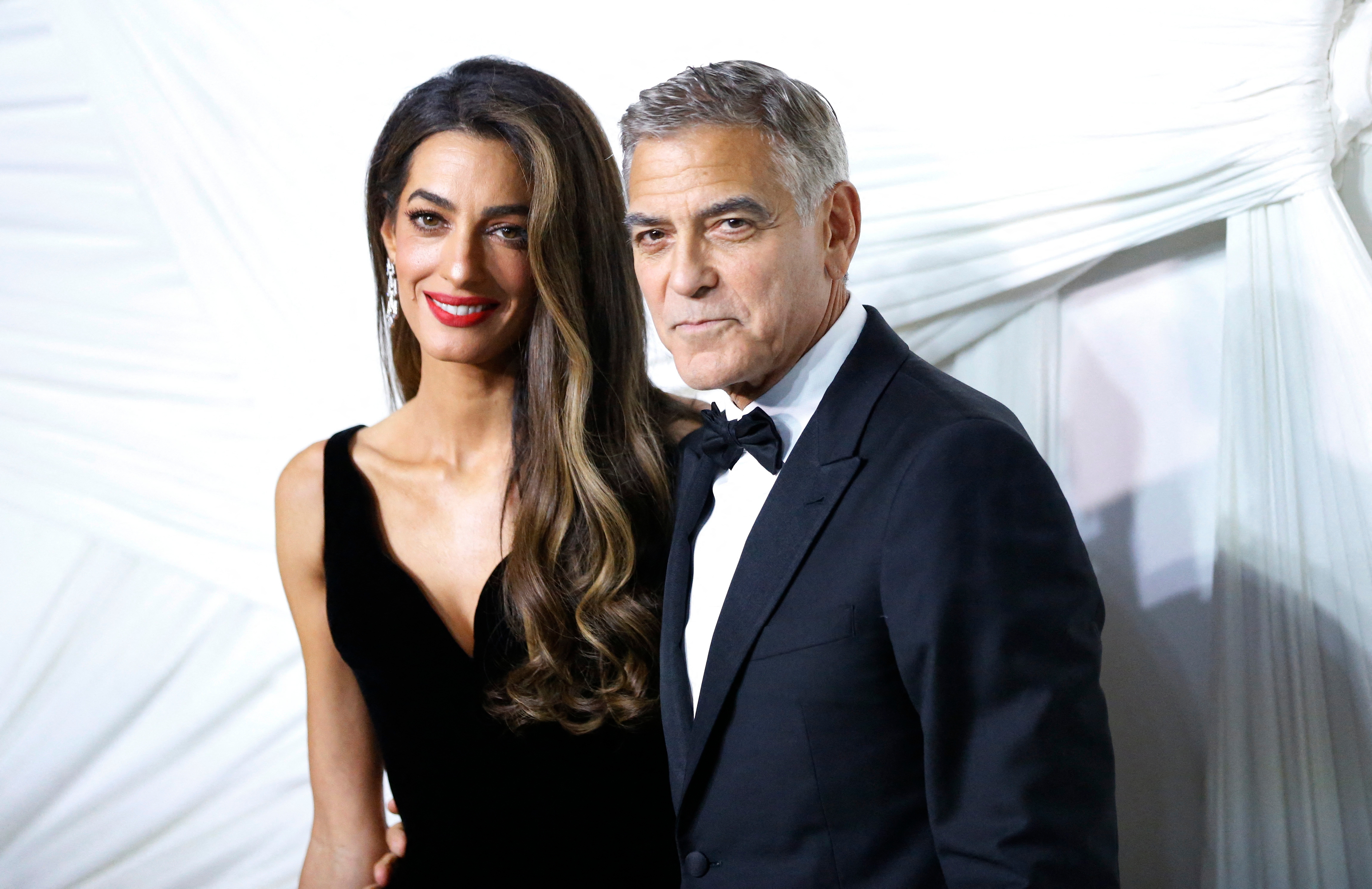 George Clooney and Amal Clooney at a formal event