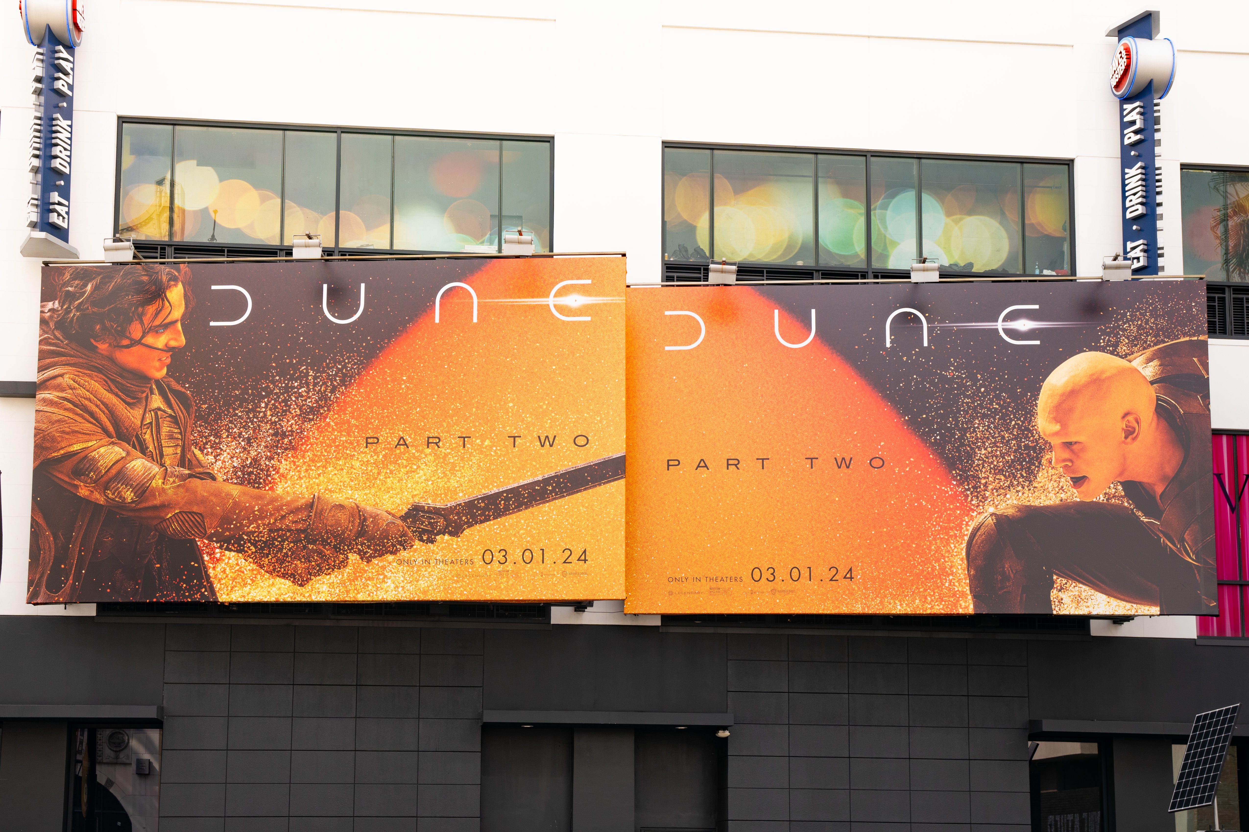 Two billboards for "Dune: Part Two" with release date 03.01.24, featuring two characters engaged in action poses