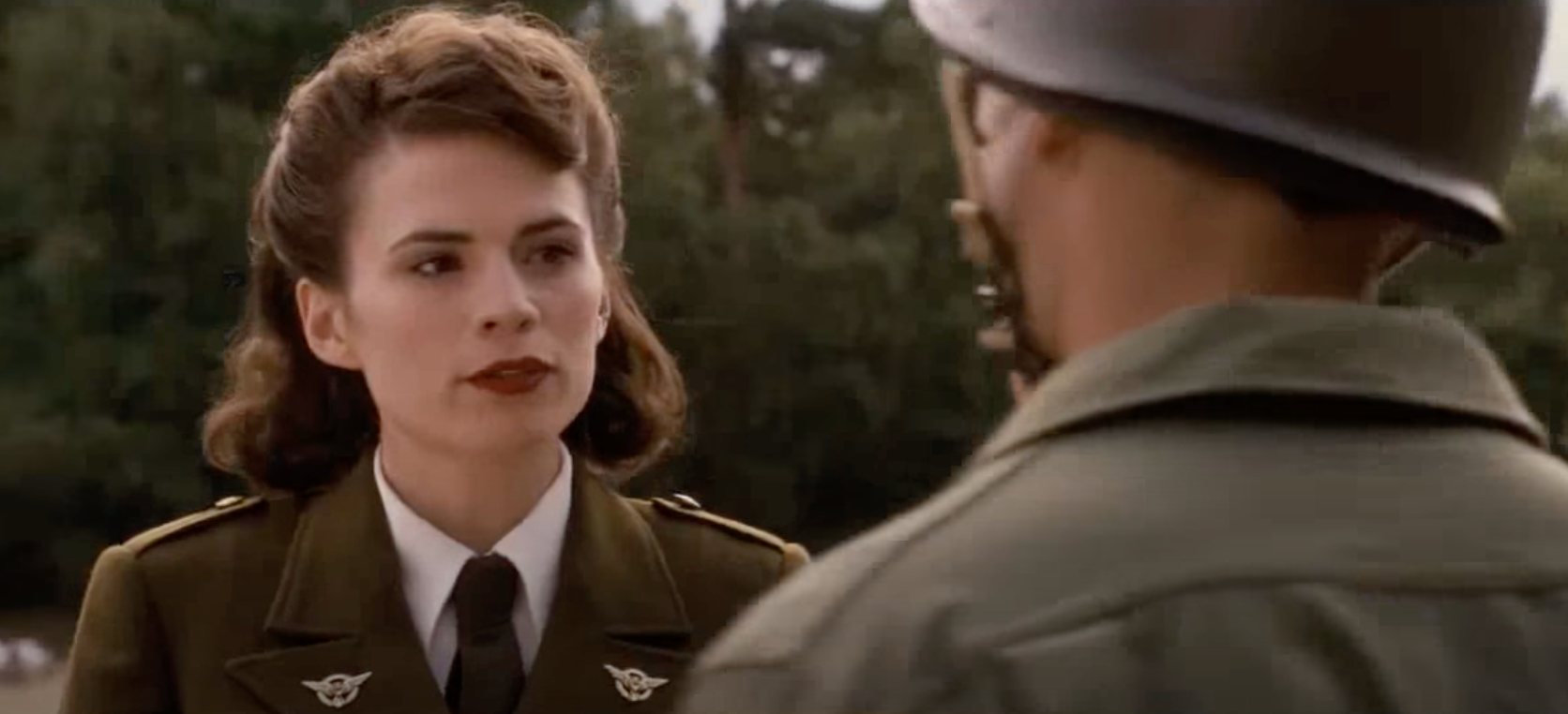 Peggy Carter in uniform, in conversation during "Captain America The First Avenger"