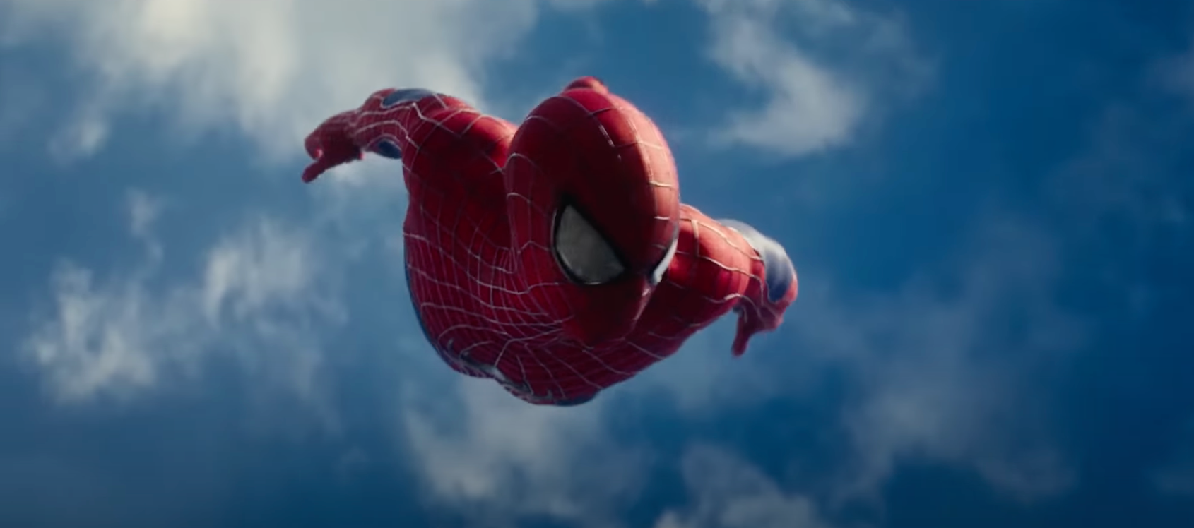 Spider-Man flies through the sky against a backdrop of clouds
