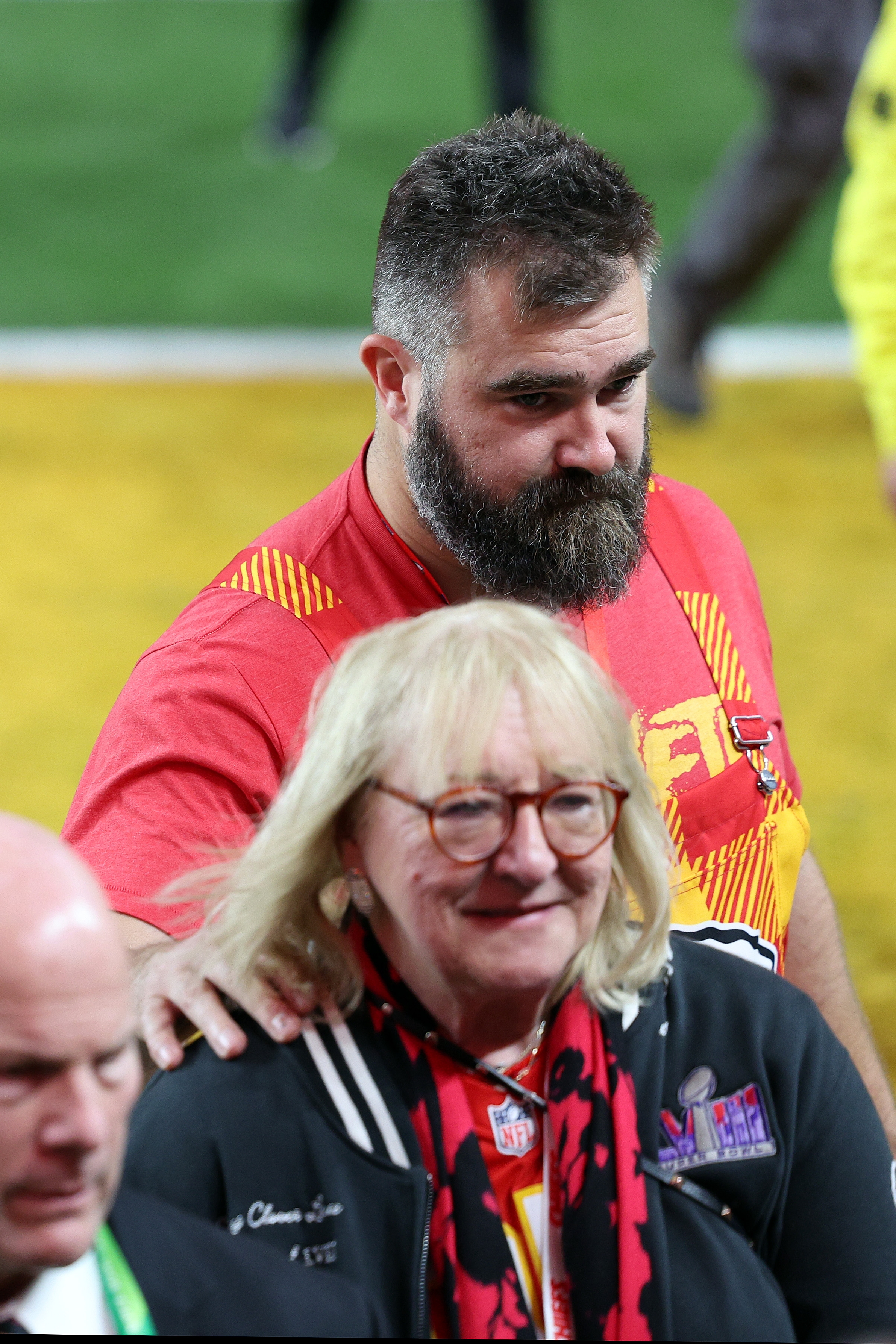Jason Kelce and his mom, Donna Kelce, on a sports field