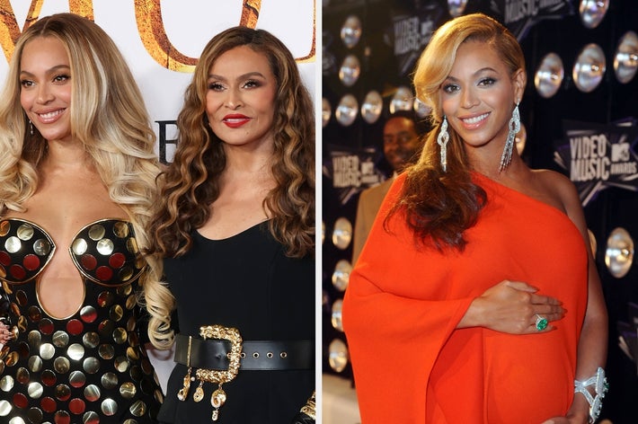 Two women pose on a red carpet event: The left in a patterned dress, the right in a solid outfit, both smiling and wearing elegant jewelry