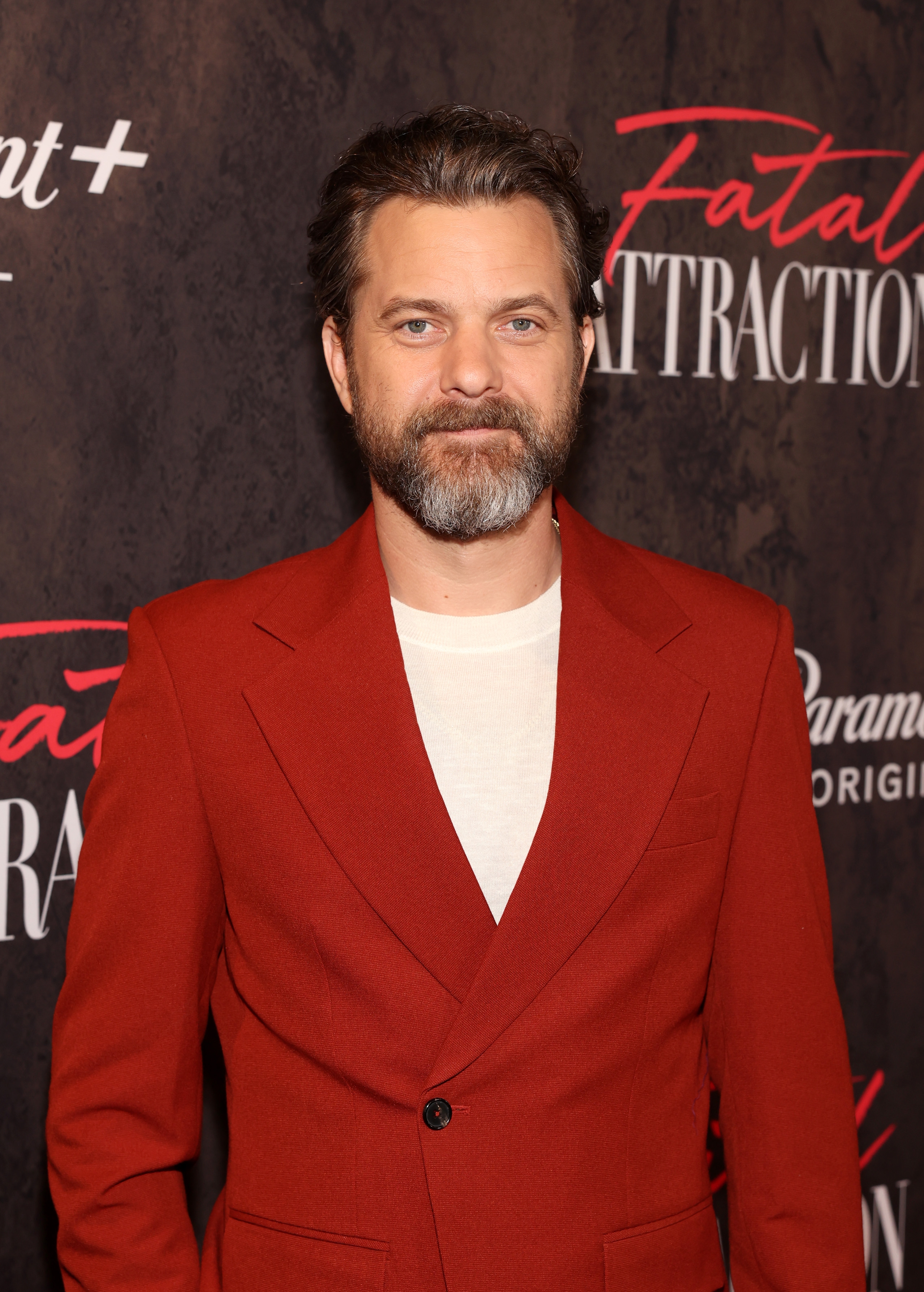 Joshua Jackson in a stylish suit at an event