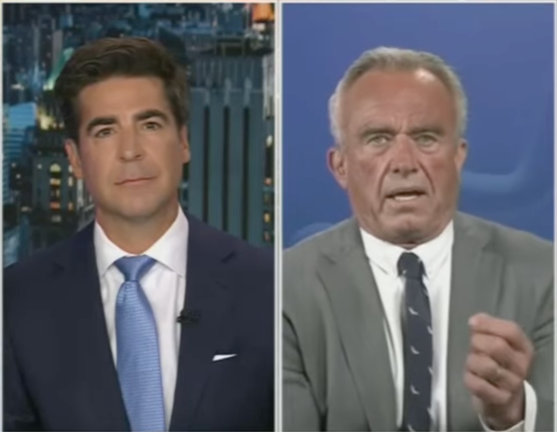 Two men in a split-screen TV interview. The man on the left wears a suit and tie; the man on the right wears a suit with a patterned tie