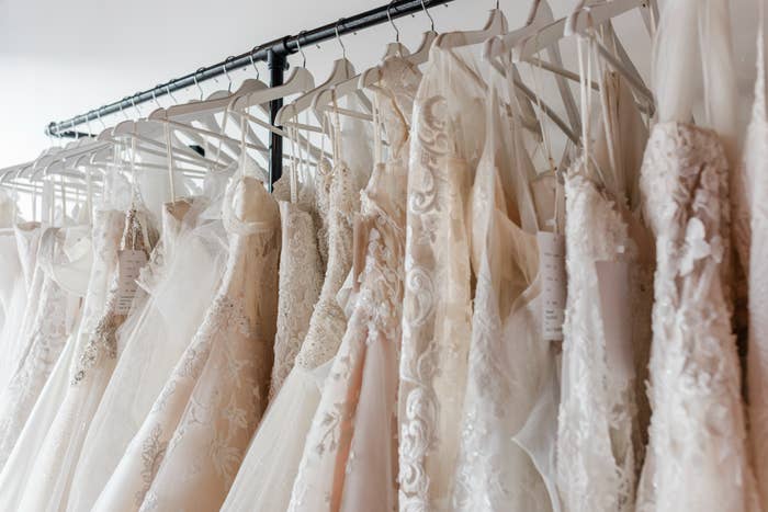 Various wedding dresses on a rack