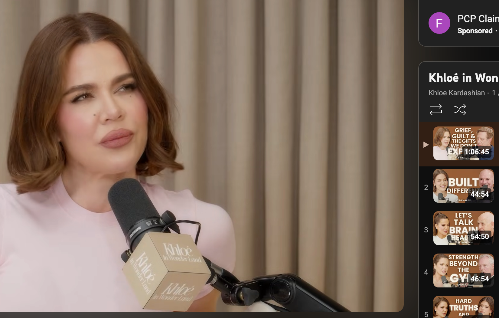 Khloé Kardashian speaking on a podcast