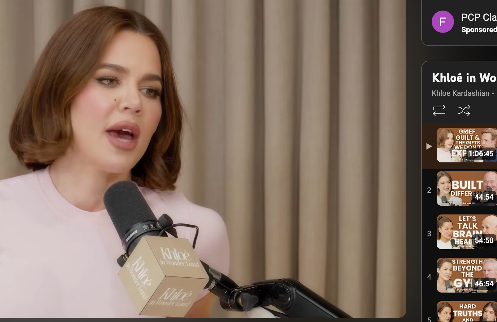 Khloé Kardashian speaking on a podcast