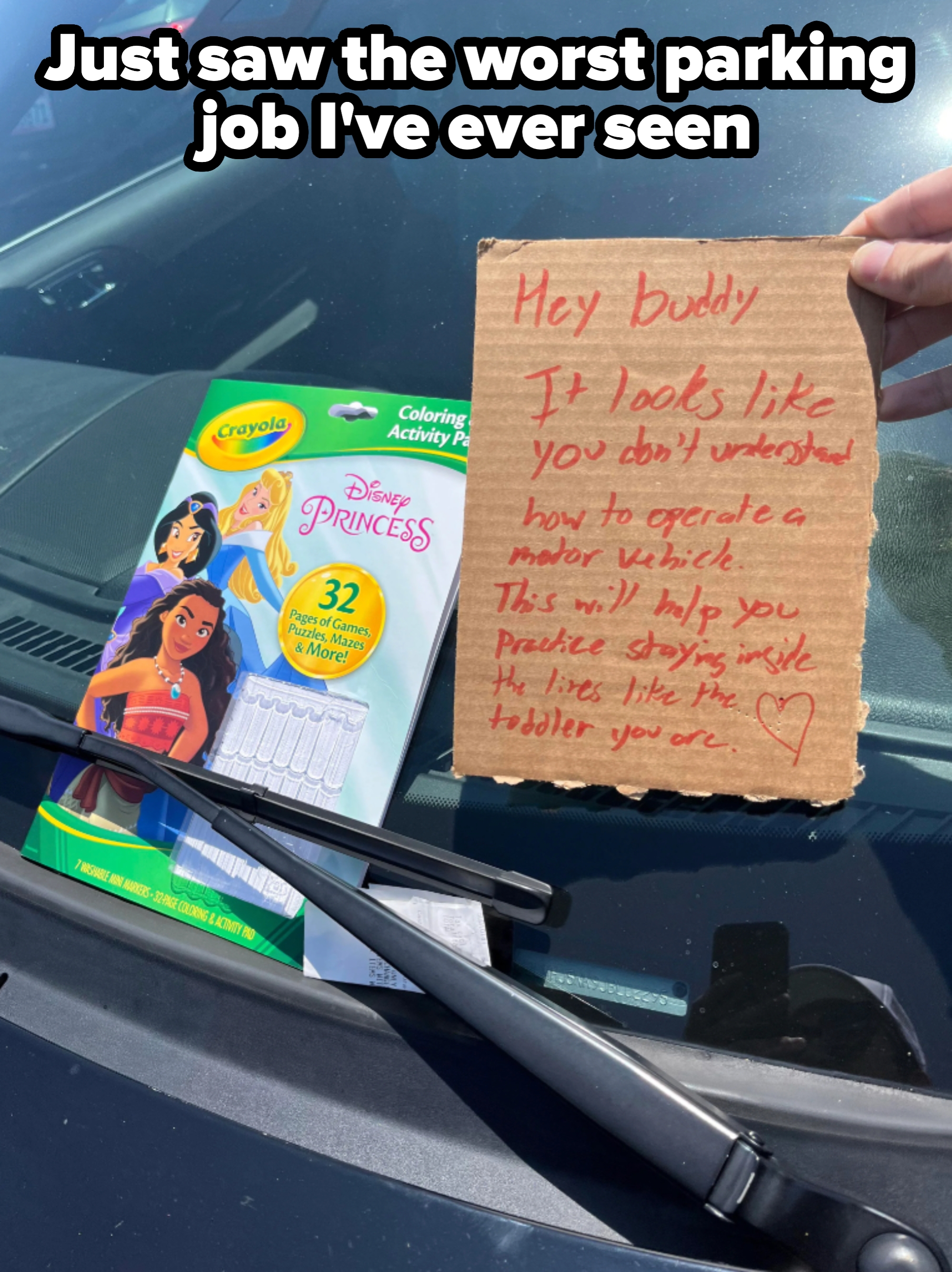 Crayola Disney Princess coloring set on car windshield, note reads sarcastically about driving skills