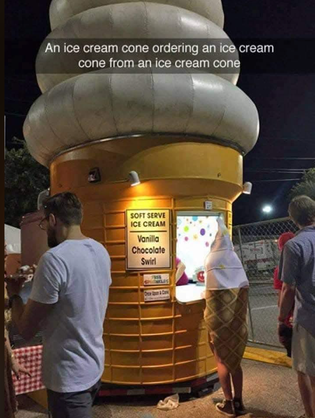 Person in ice cream cone costume orders at ice cream-shaped kiosk. Sign lists available flavors: vanilla, chocolate, swirl