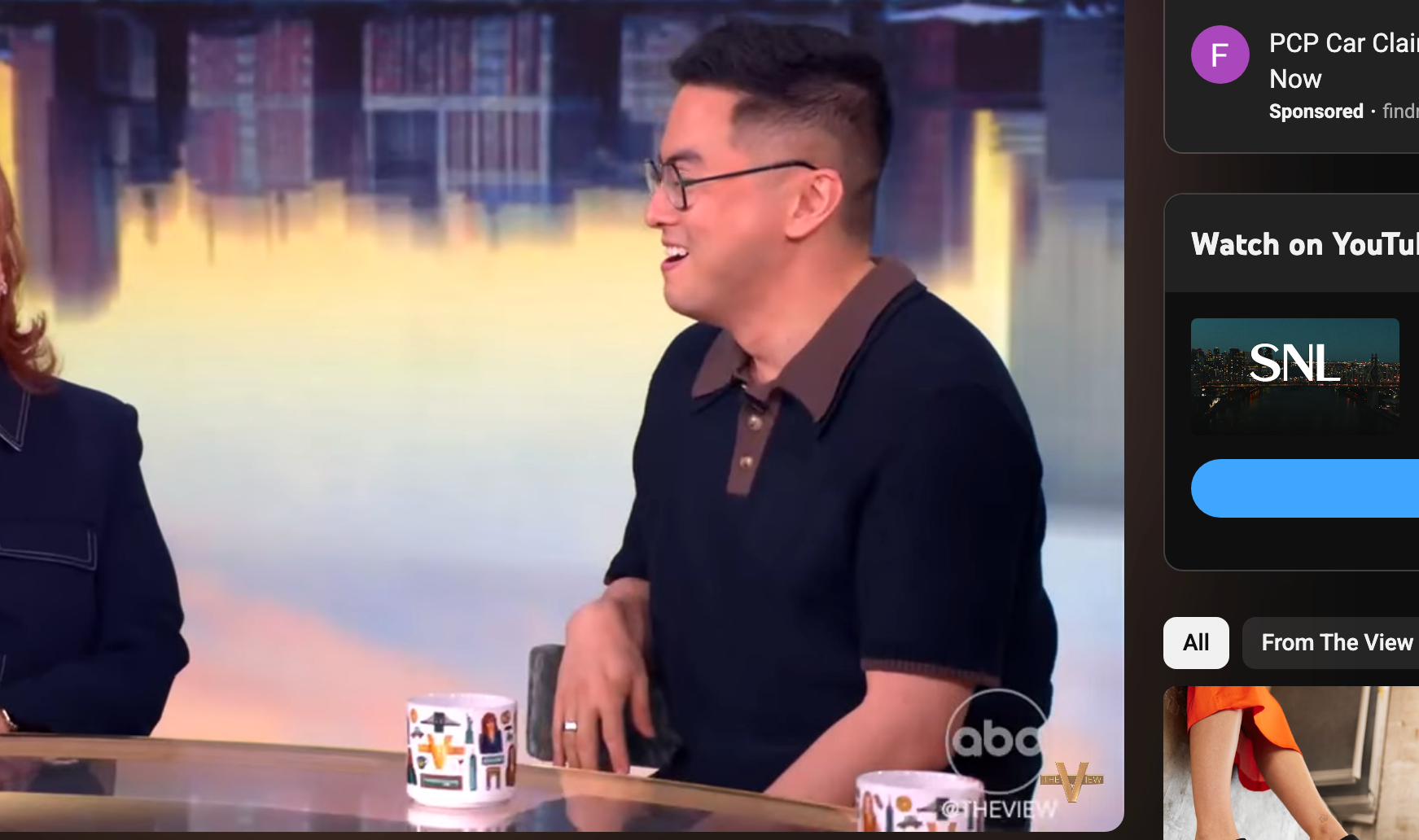 Joy Behar with a blank facial expression next to Bowen Yang on &quot;The View&quot;