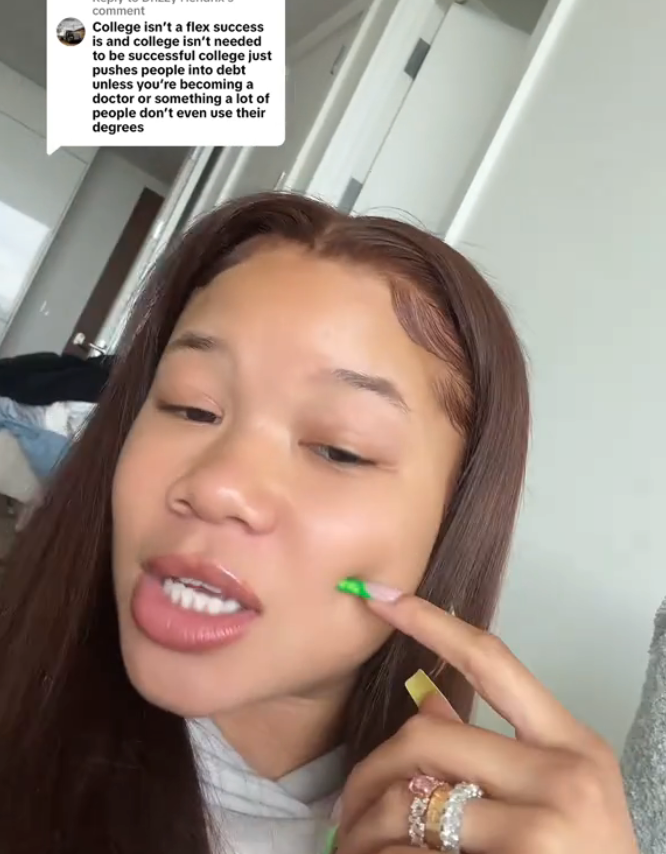 Person discussing college importance, expressing opinion about degrees not being necessary for success, with focus on personal perspective