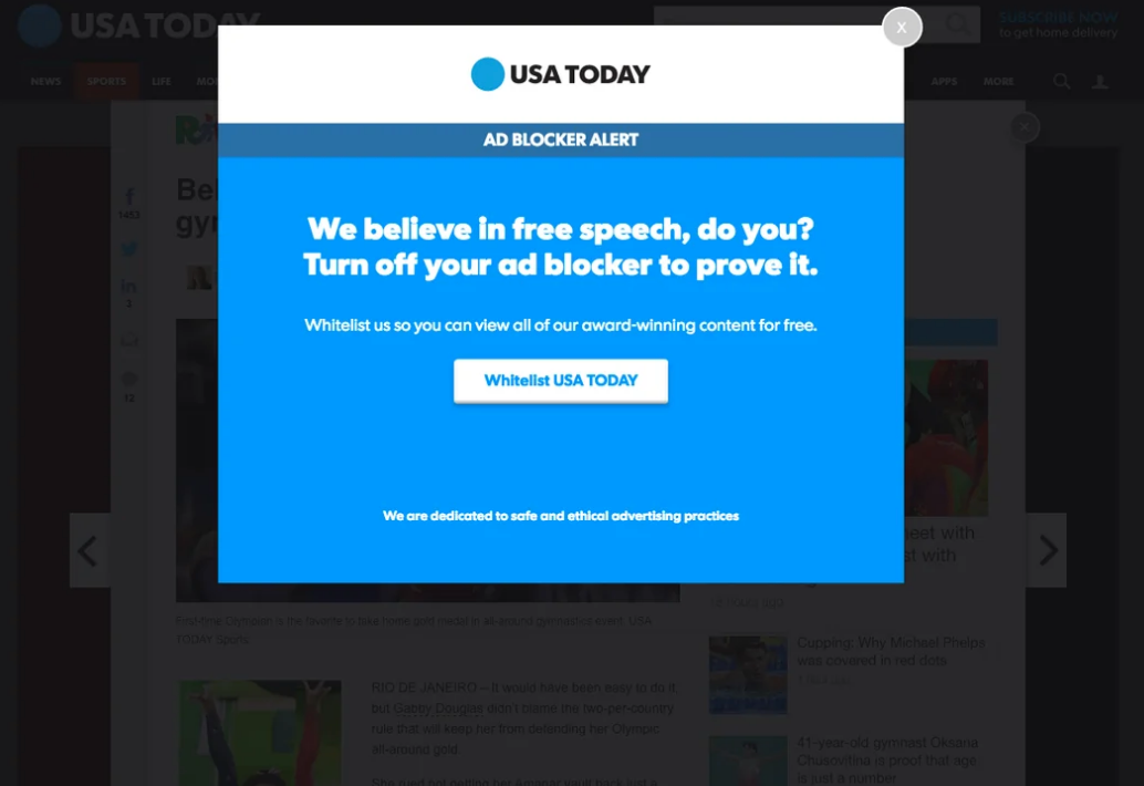 Pop-up message on USA Today website asks users to disable ad blockers to access award-winning content for free, saying, "we believe in free speech, do you? Turn off your ad blocker to prove it"