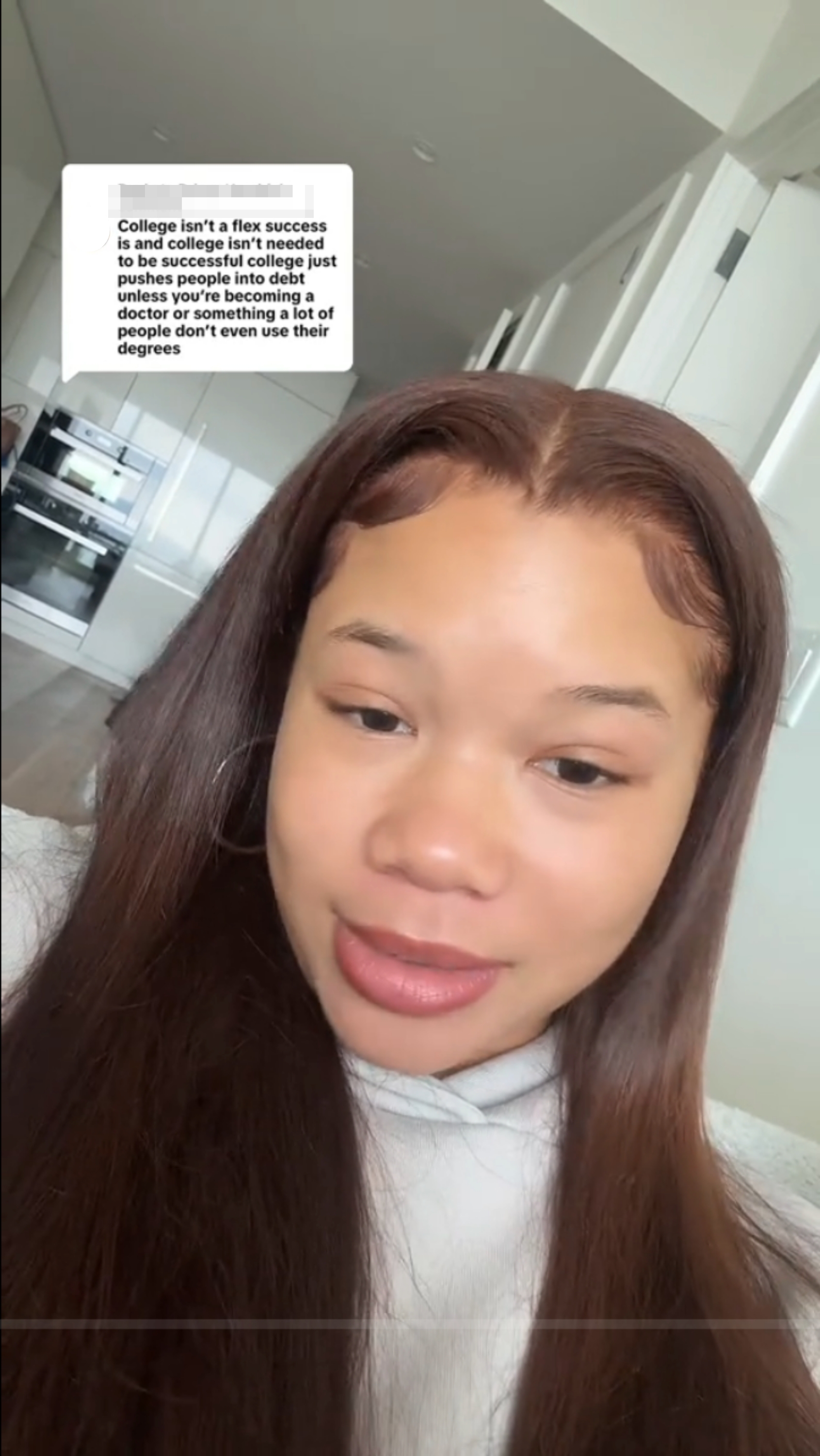 Person with long hair smiling, wearing a white shirt indoors. Text in the image discusses opinions on college's role in achieving success