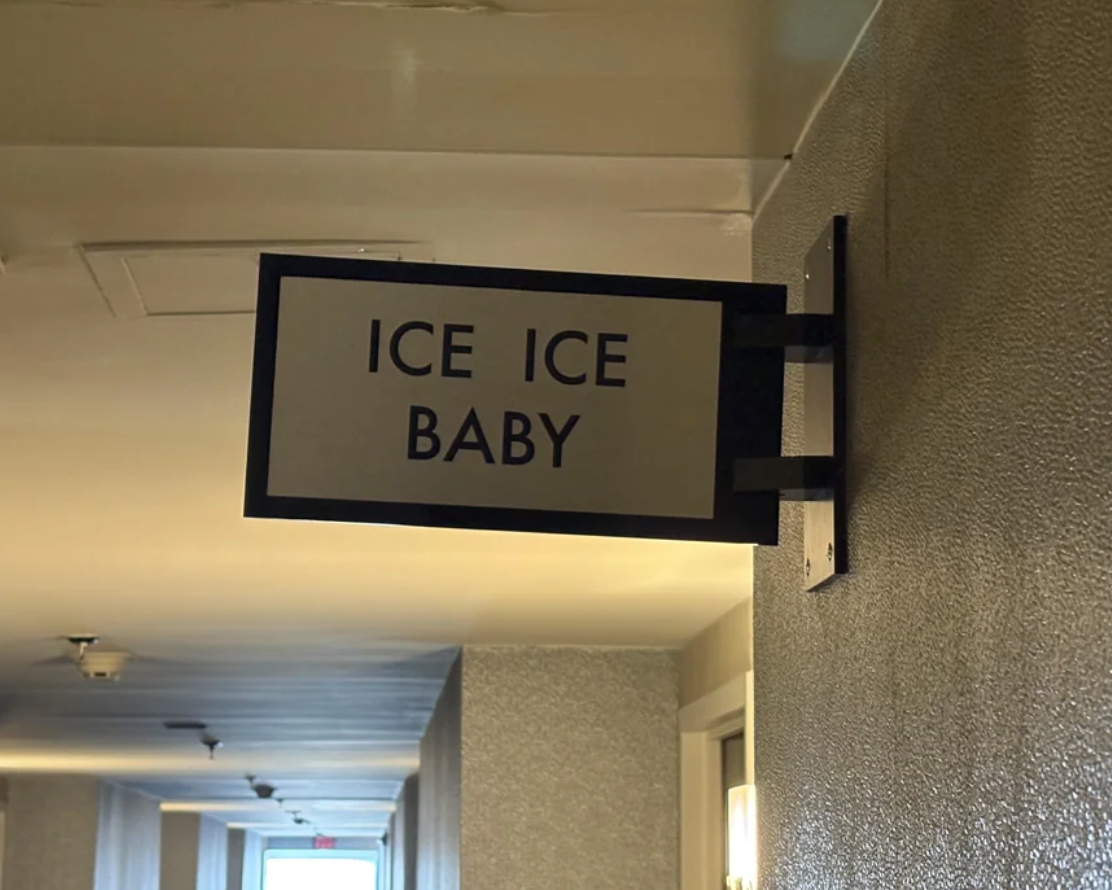 Sign in a hallway reads "ICE ICE BABY."