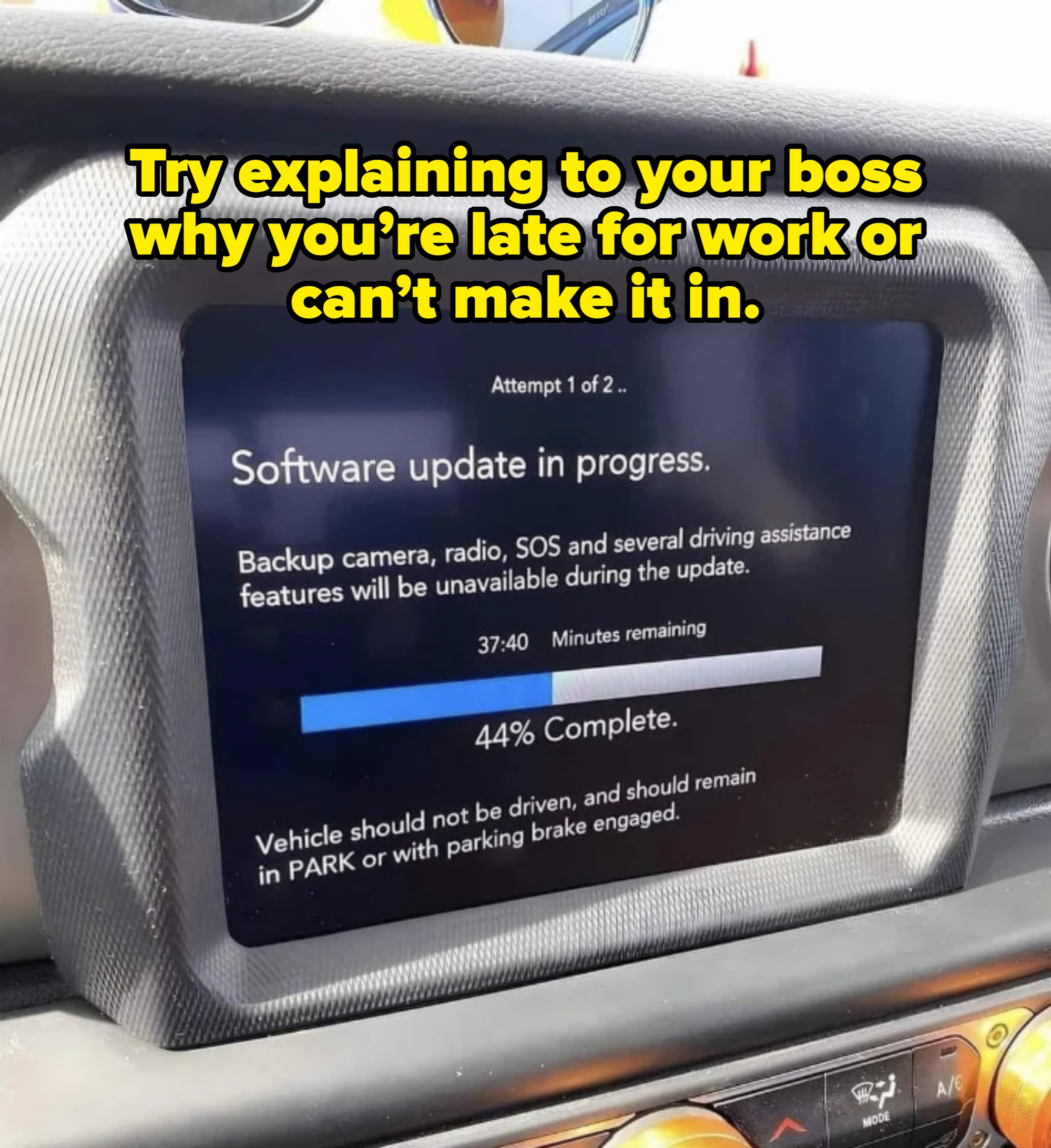 Car software update screen showing progress bar at 44% with 37:40 minutes remaining. Screen notes backup camera and driving features will be unavailable. Caption: "Try explaining to your boss why you’re late for work or can’t make it in"
