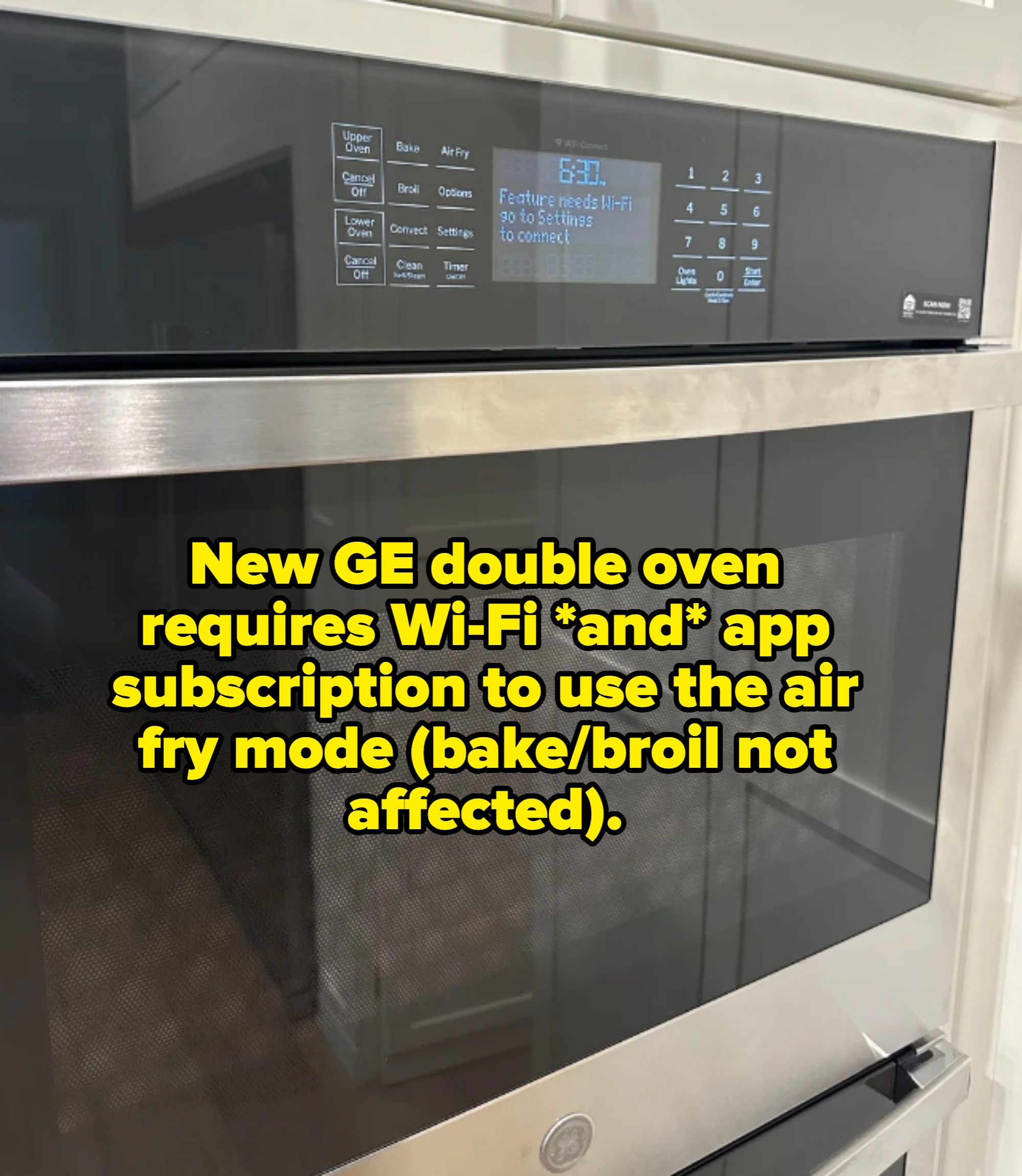 A modern double oven with caption noting you need Wi-Fi and an app subscription to use the air fry mode