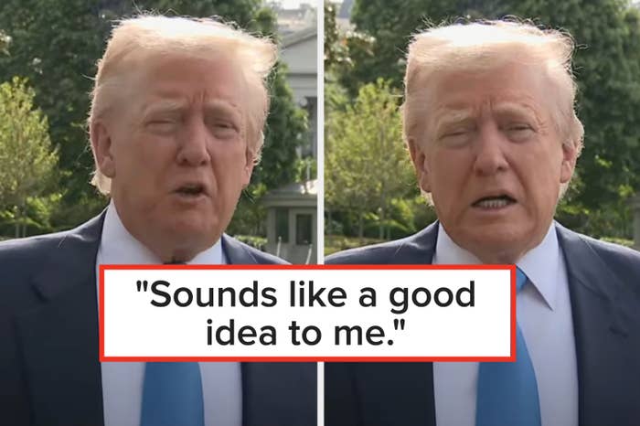 A man in a suit and tie is speaking outdoors. The background includes greenery, suggesting a park or garden setting